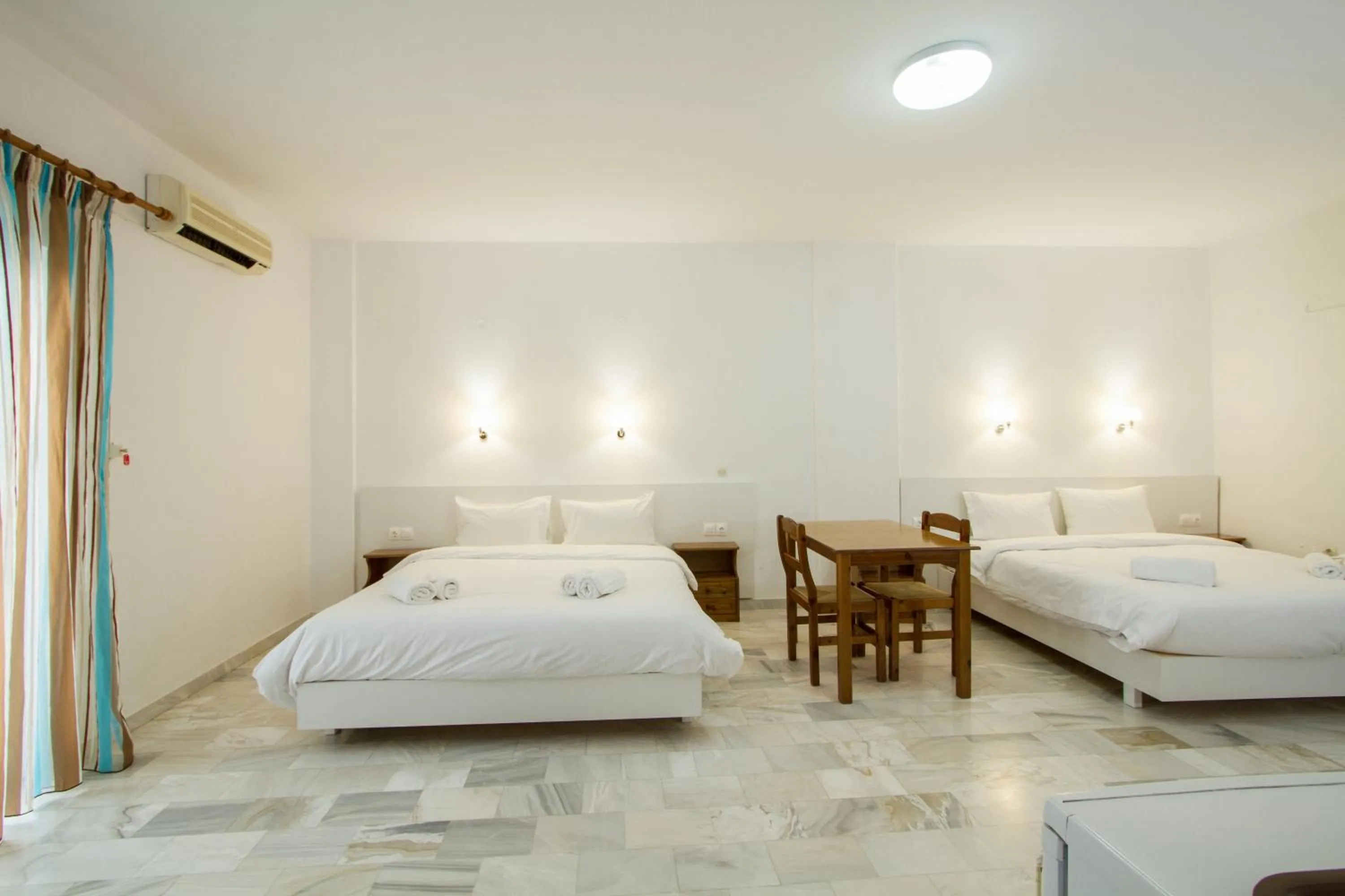 Bedroom in Revekka Rooms