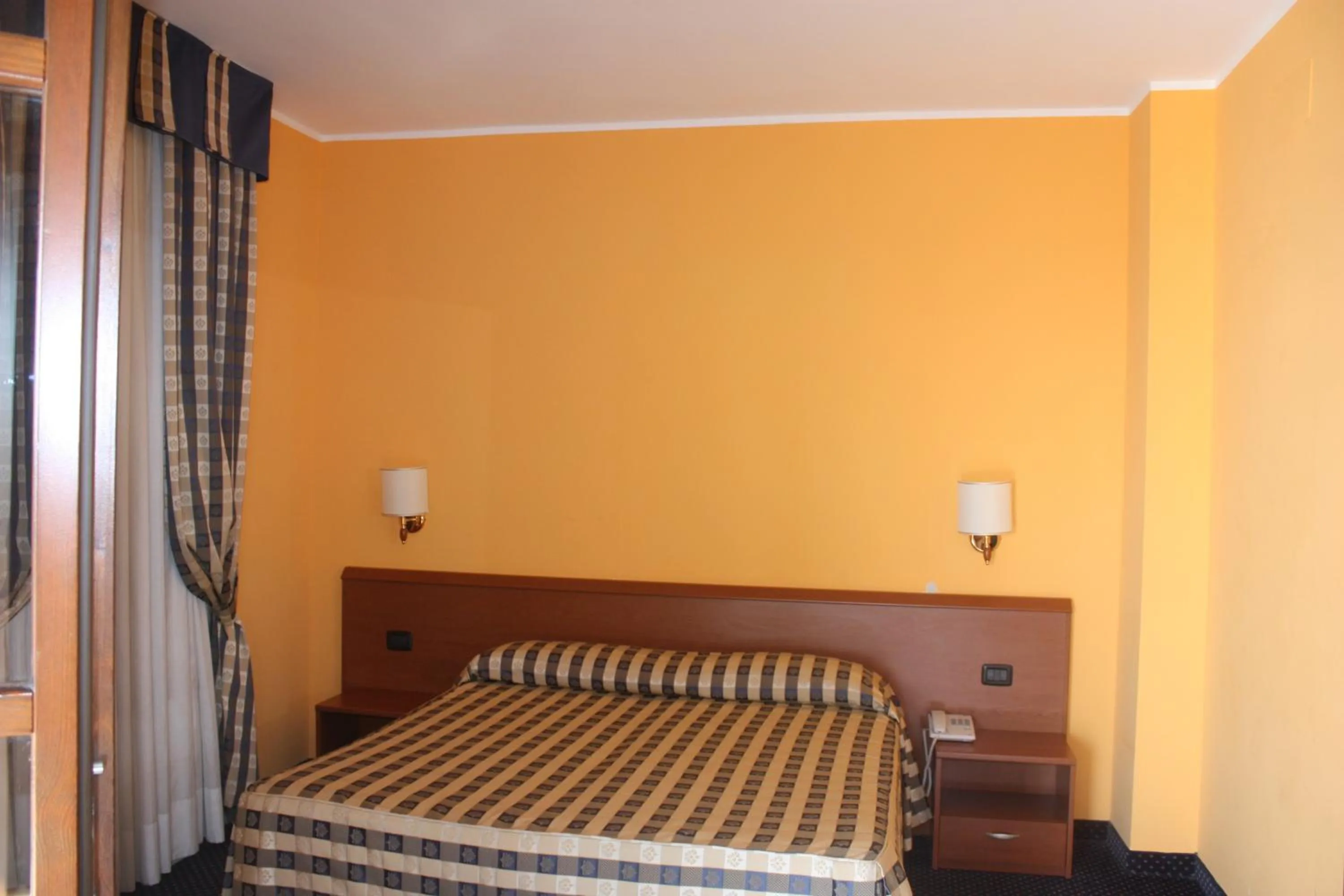 Bed in Hotel Tre Denti