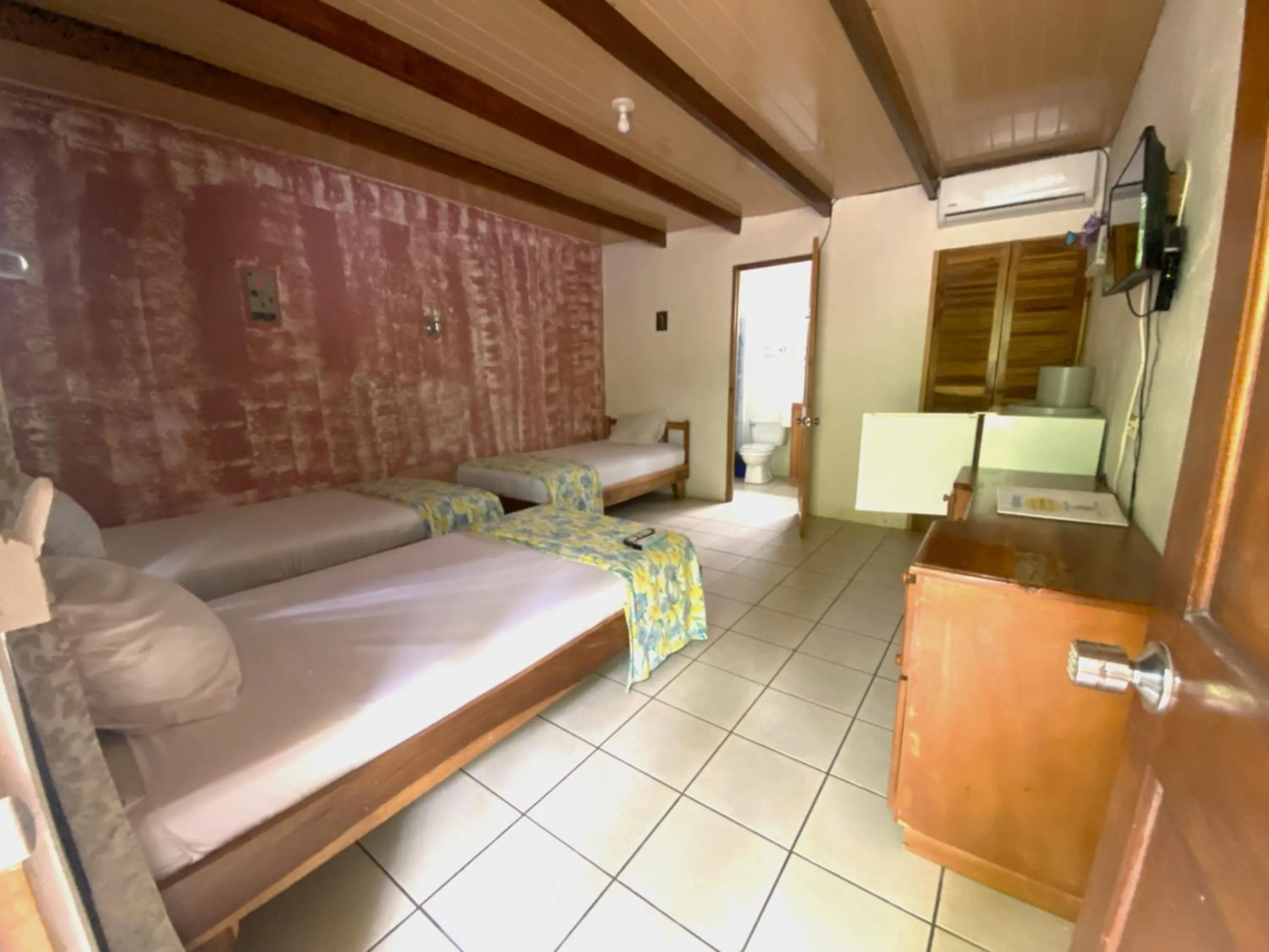 Bed in Mapi's Cabins