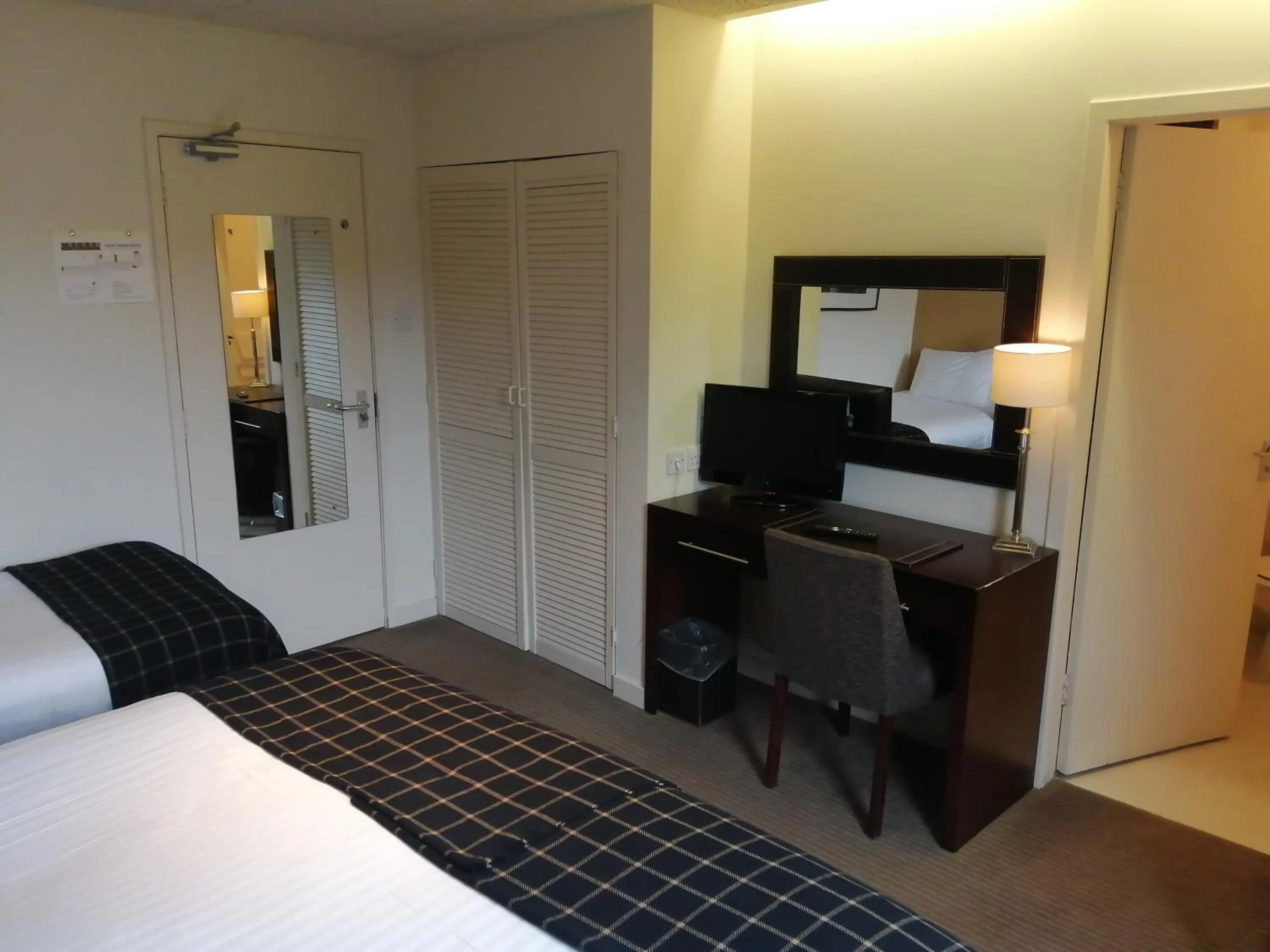 Bed in Eight Acres Hotel