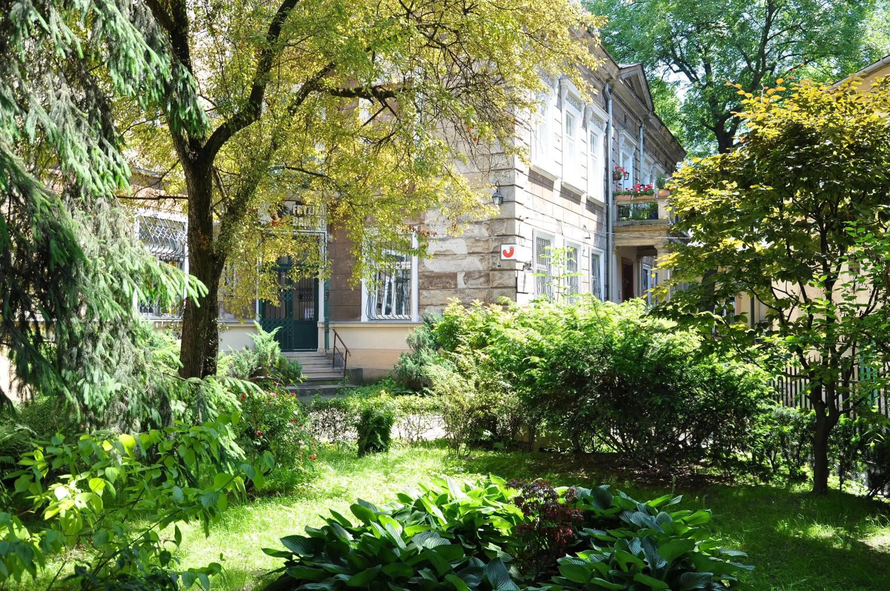 Property logo or sign in Red Kurka Apartments