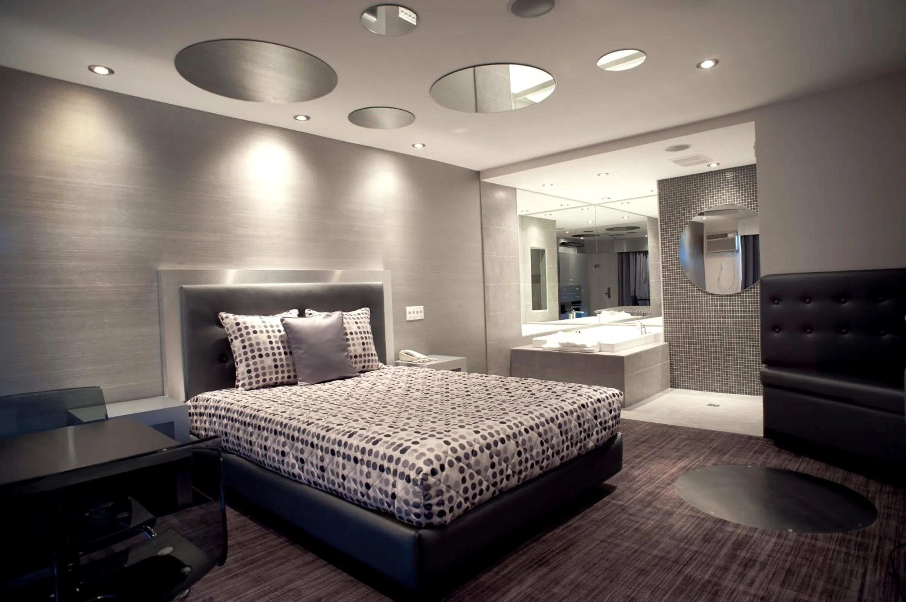 Bed in Le Fabreville Motel & Suites