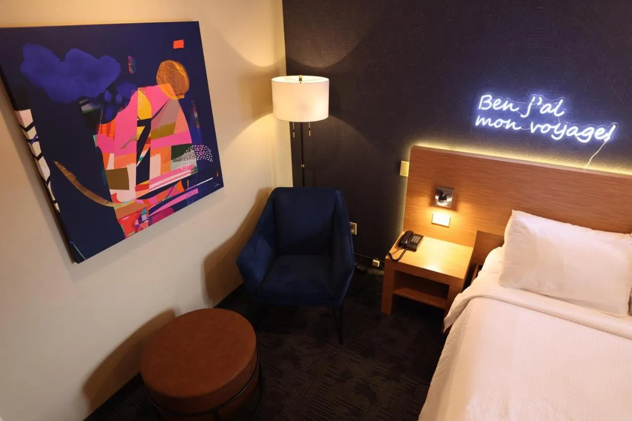 Bed in Le Fabreville Motel & Suites