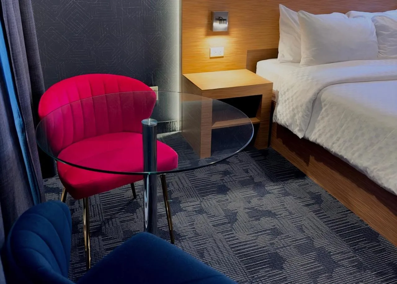 Bed in Le Fabreville Motel & Suites