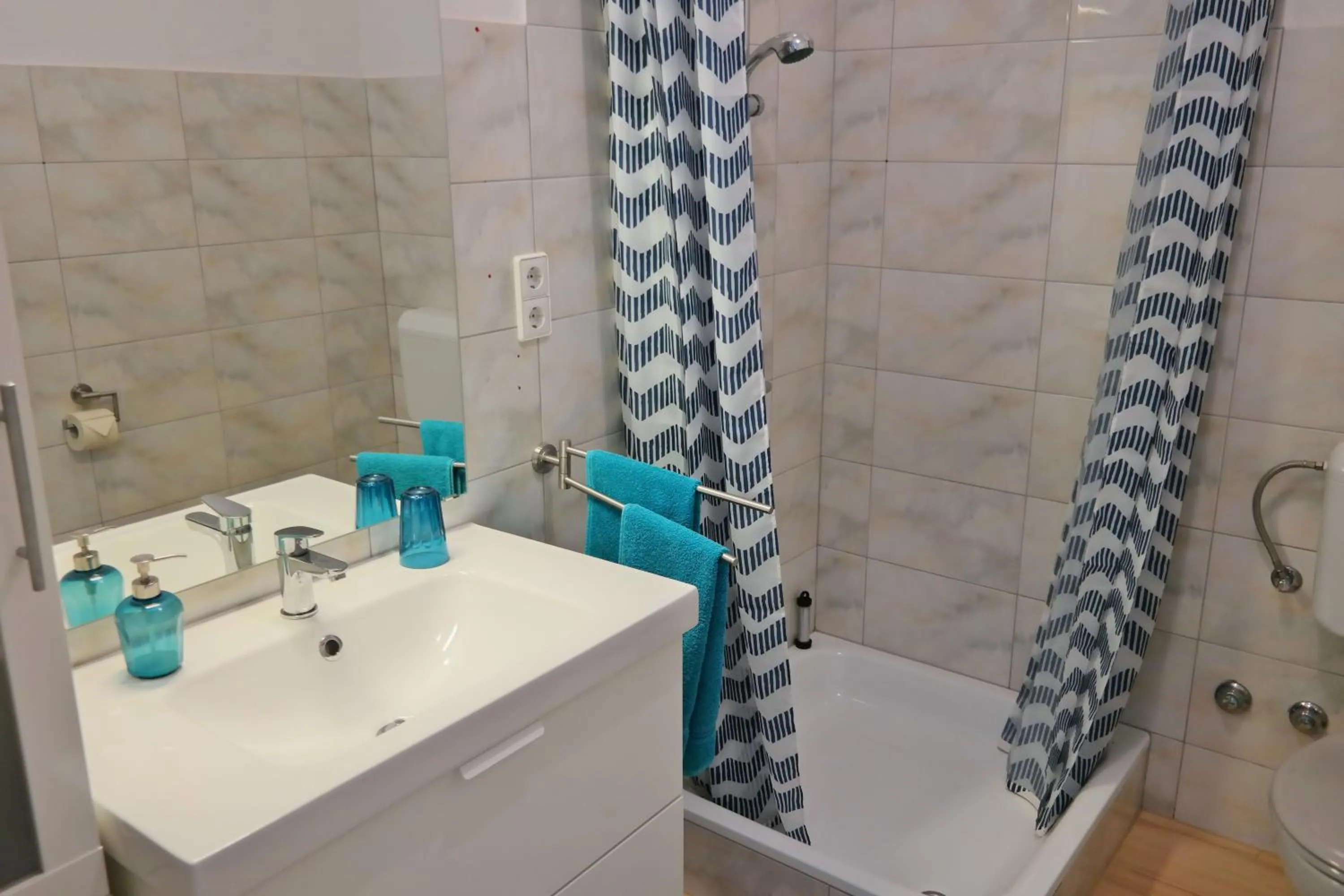 Bathroom in Direkt am Meer-Apartments Puntaplanka