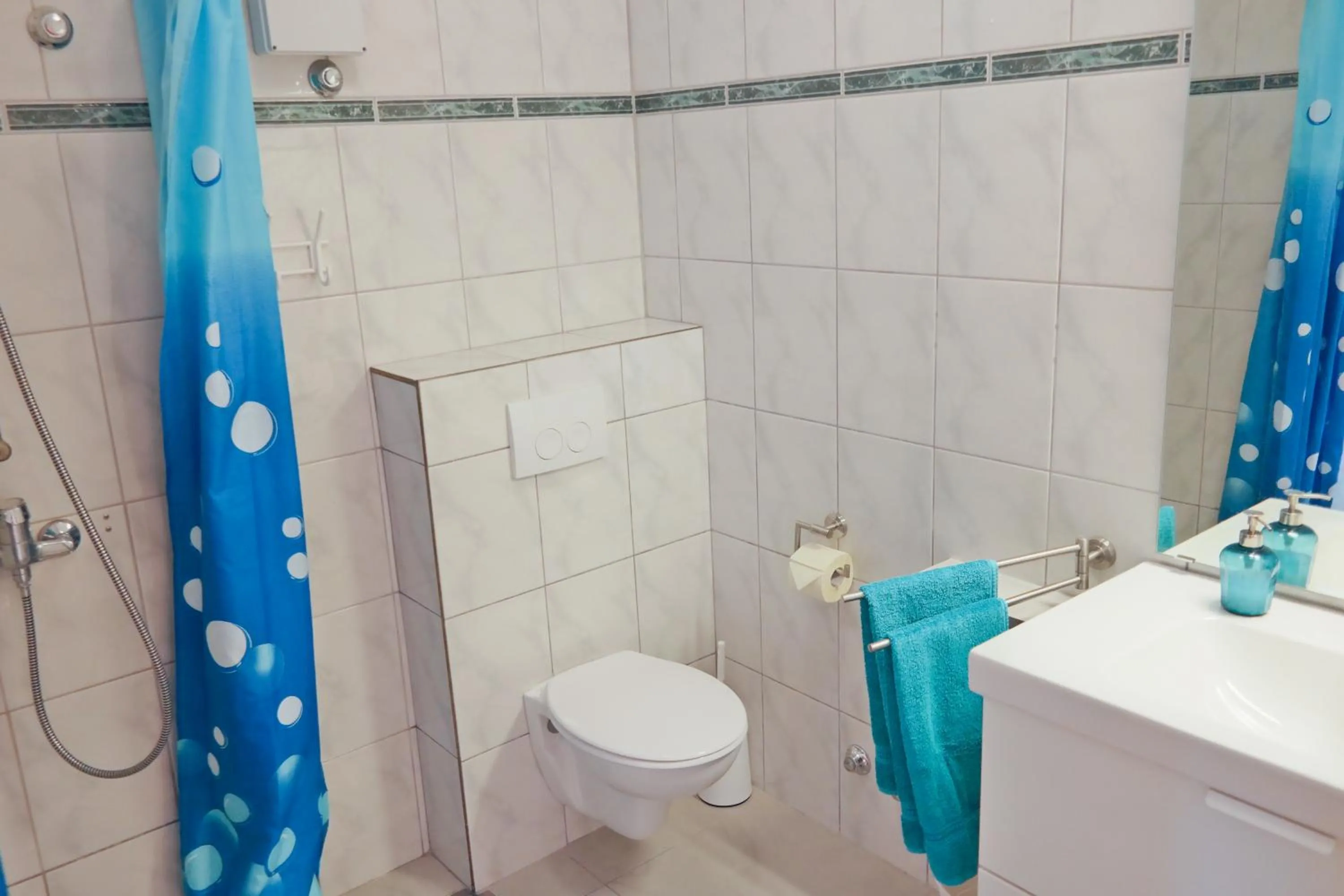 Bathroom in Direkt am Meer-Apartments Puntaplanka