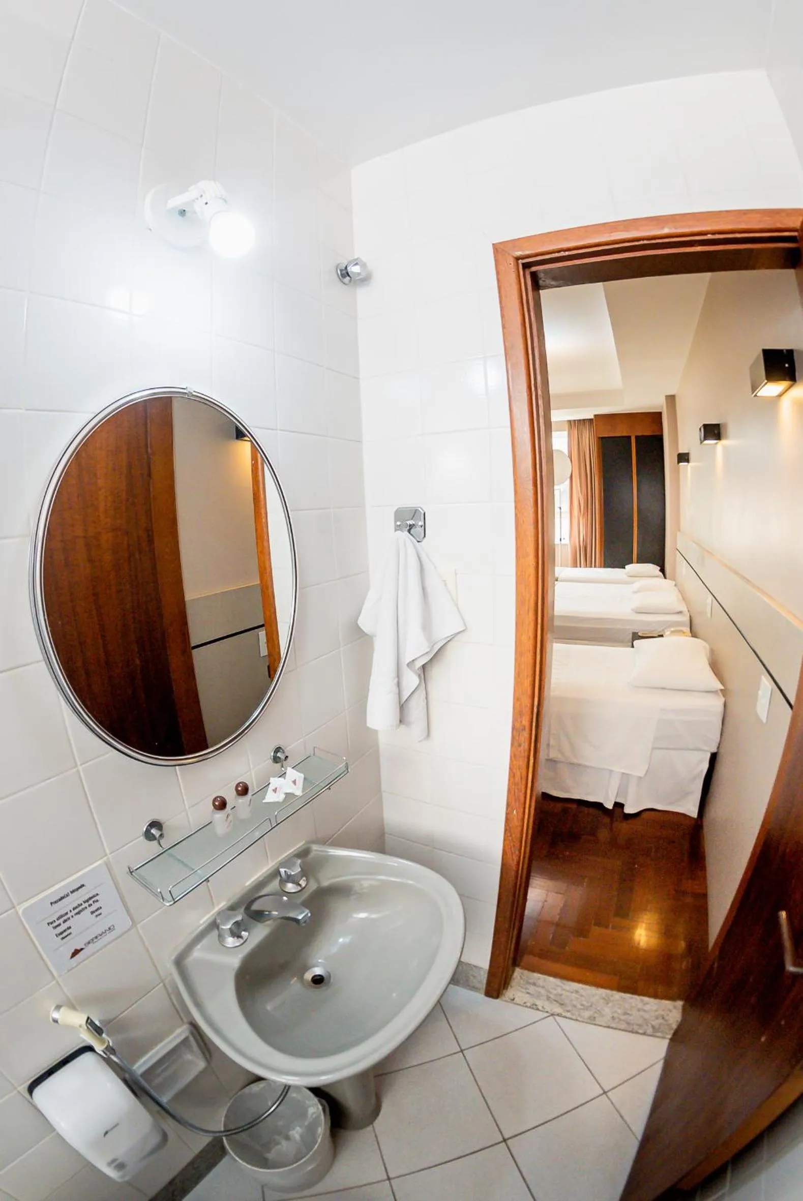 Bed in Serrano Residencial Hotel