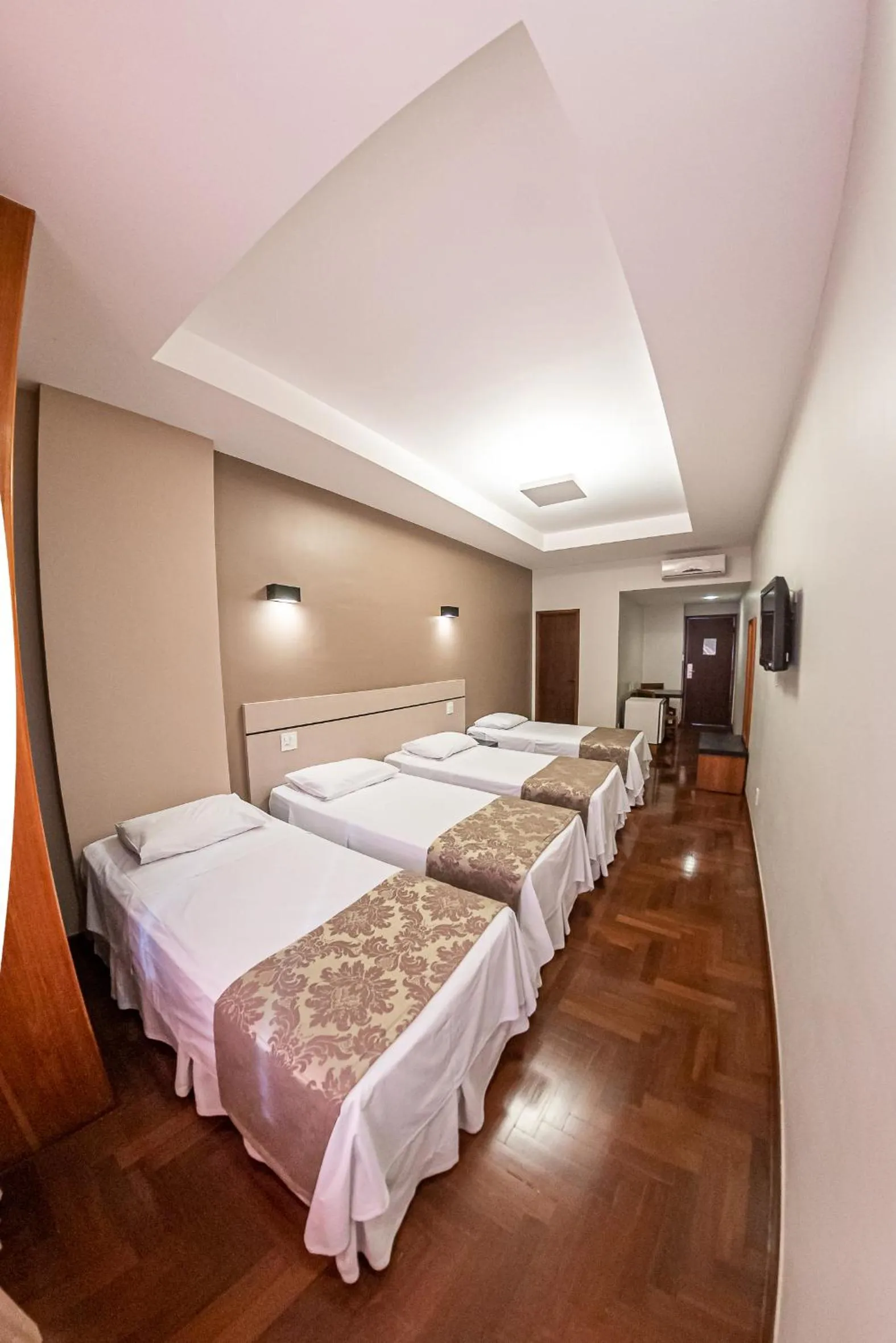 Bed in Serrano Residencial Hotel
