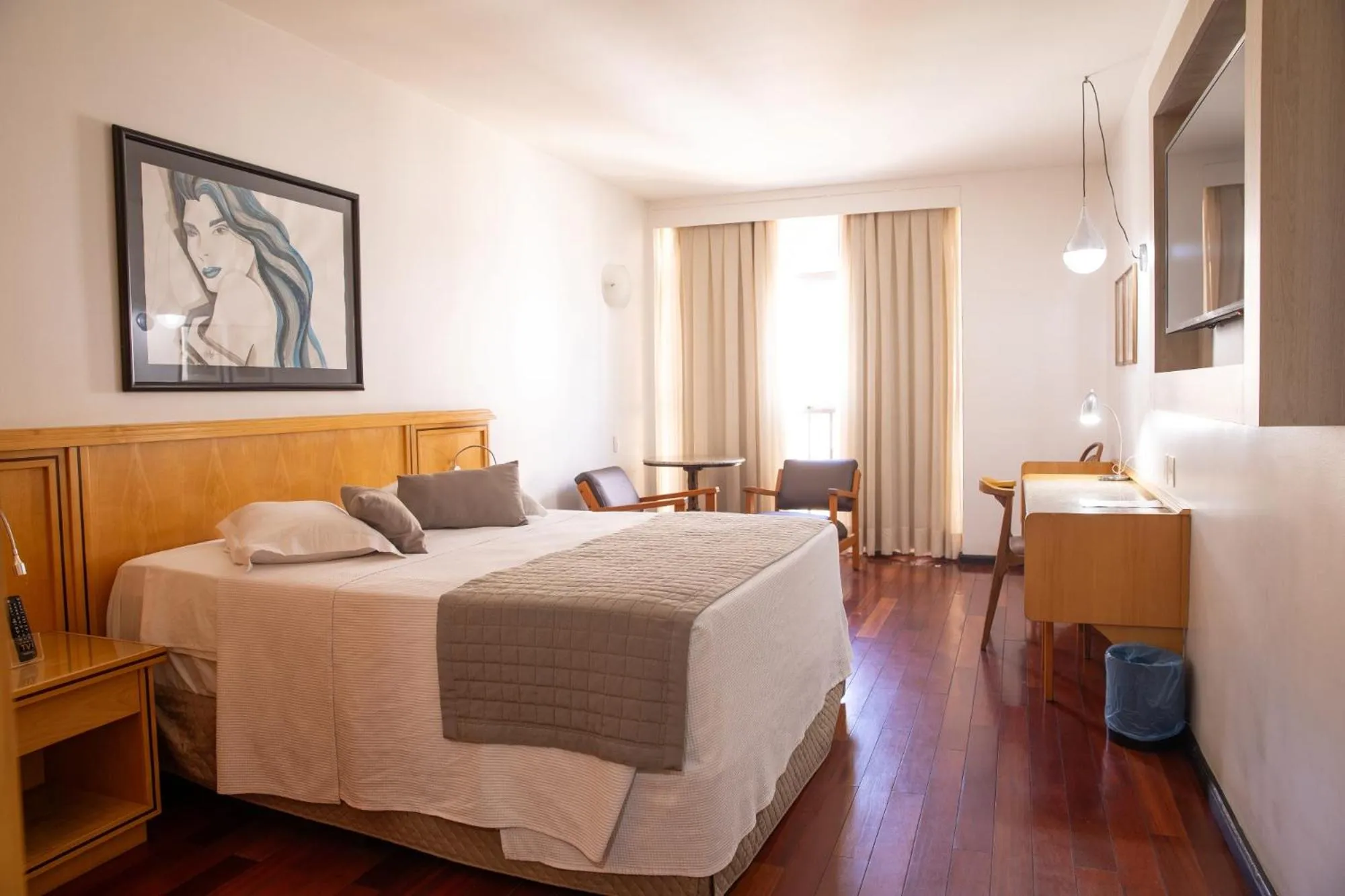 Bed in Ritz Plaza Hotel