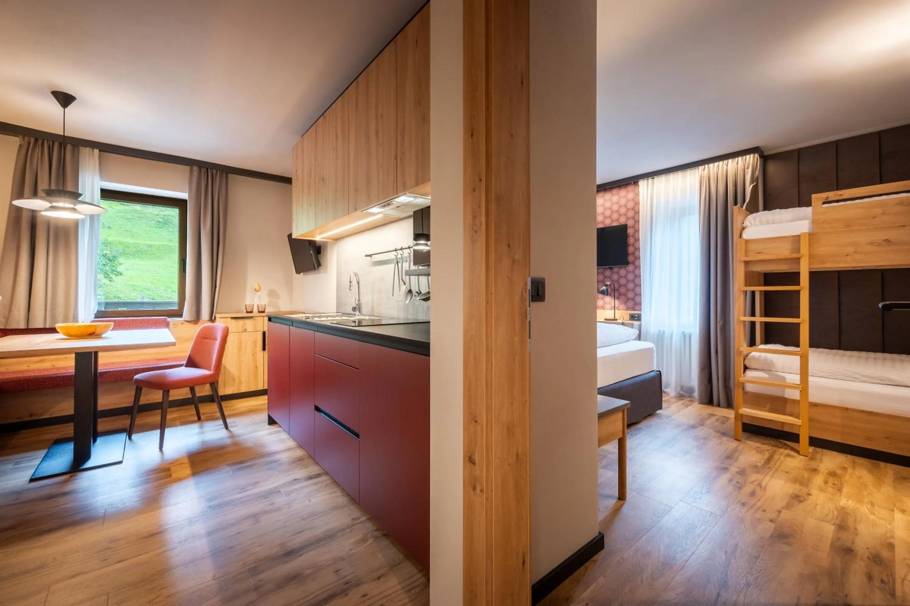 Kitchen or kitchenette, Bed in Hotel Vioz
