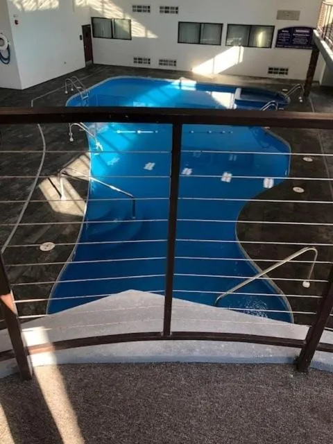 Swimming pool in Boarders Inn & Suites by Cobblestone Hotels - Grand Island