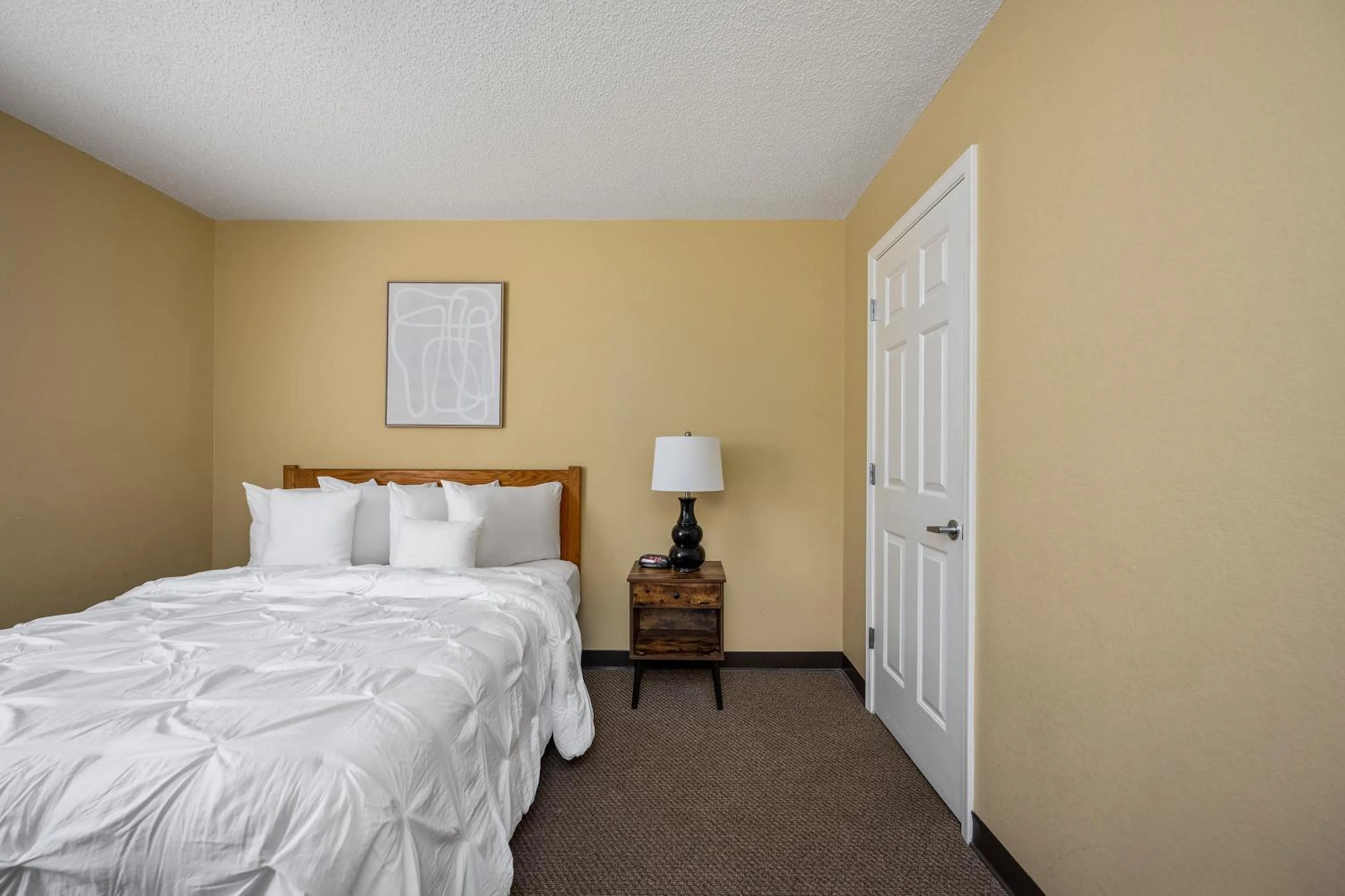 Bed in Affordable Suites Myrtle Beach