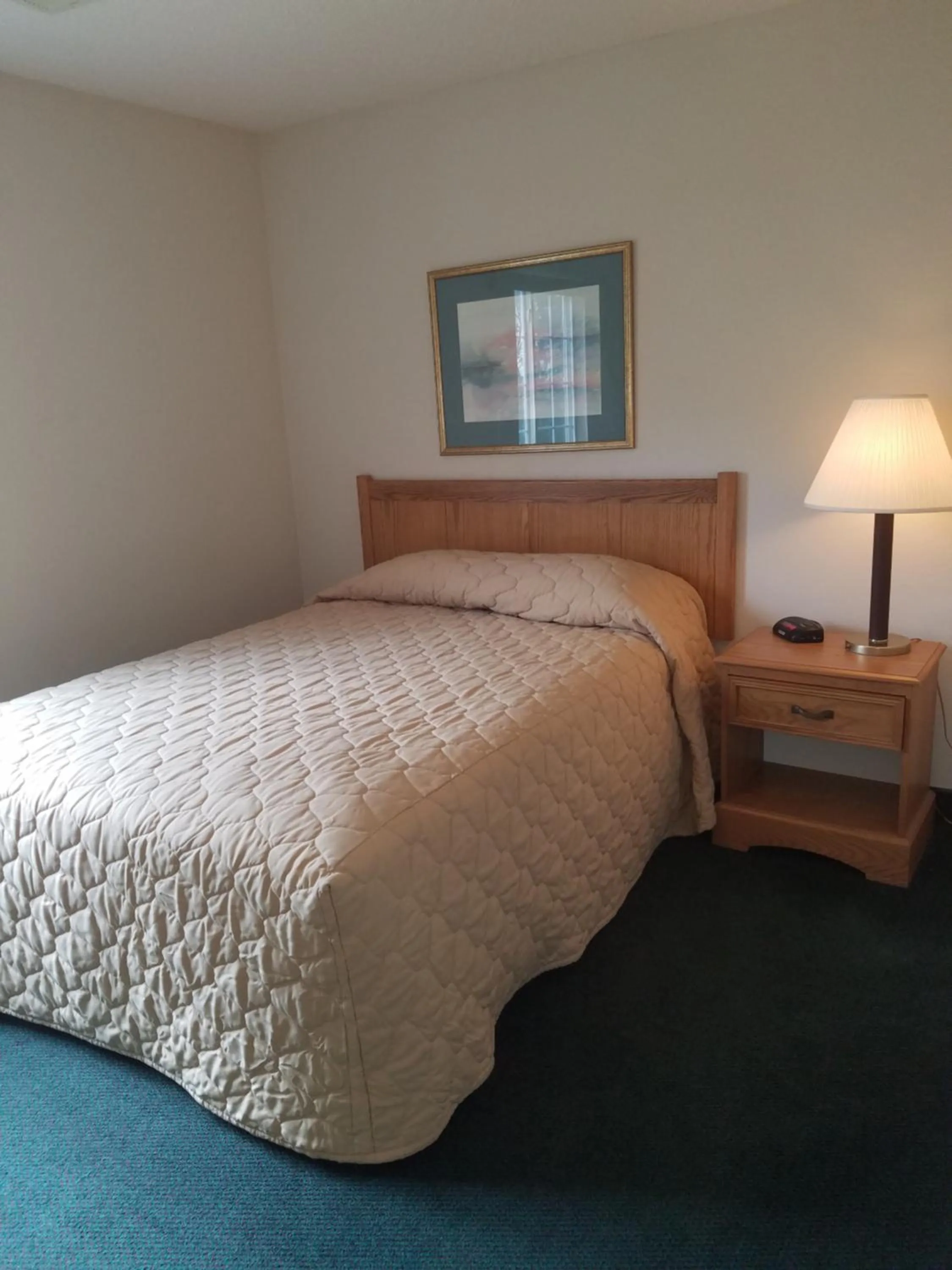 Bed in Affordable Suites Gastonia