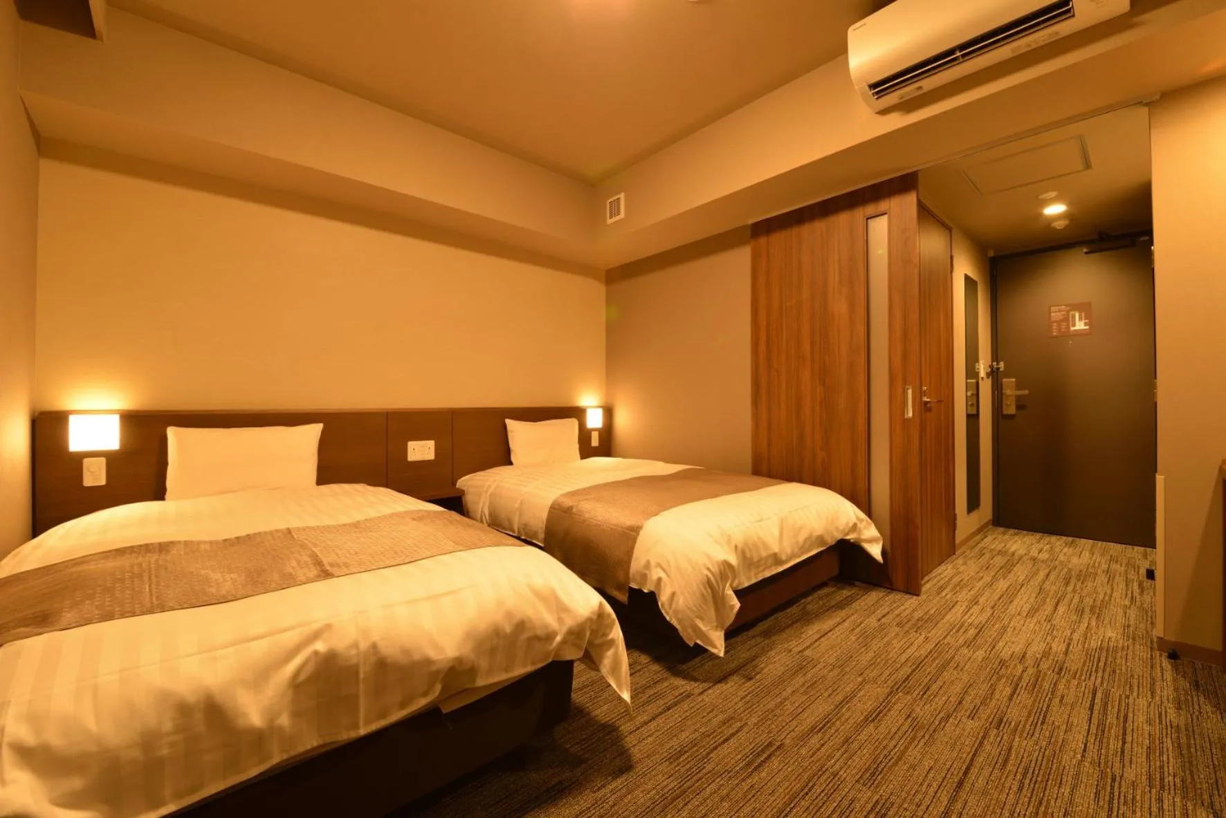 Bed in Dormy Inn Takamatsu Chuo Koenmae Natural Hot Spring