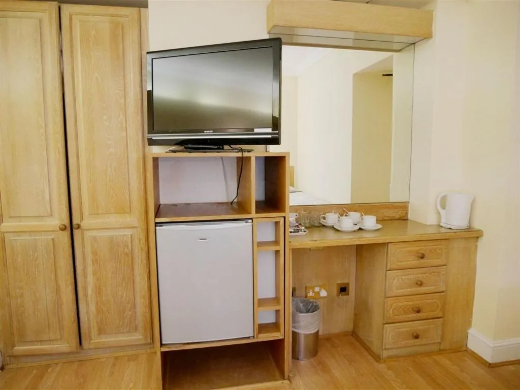 Bedroom in The Gresham Hotel