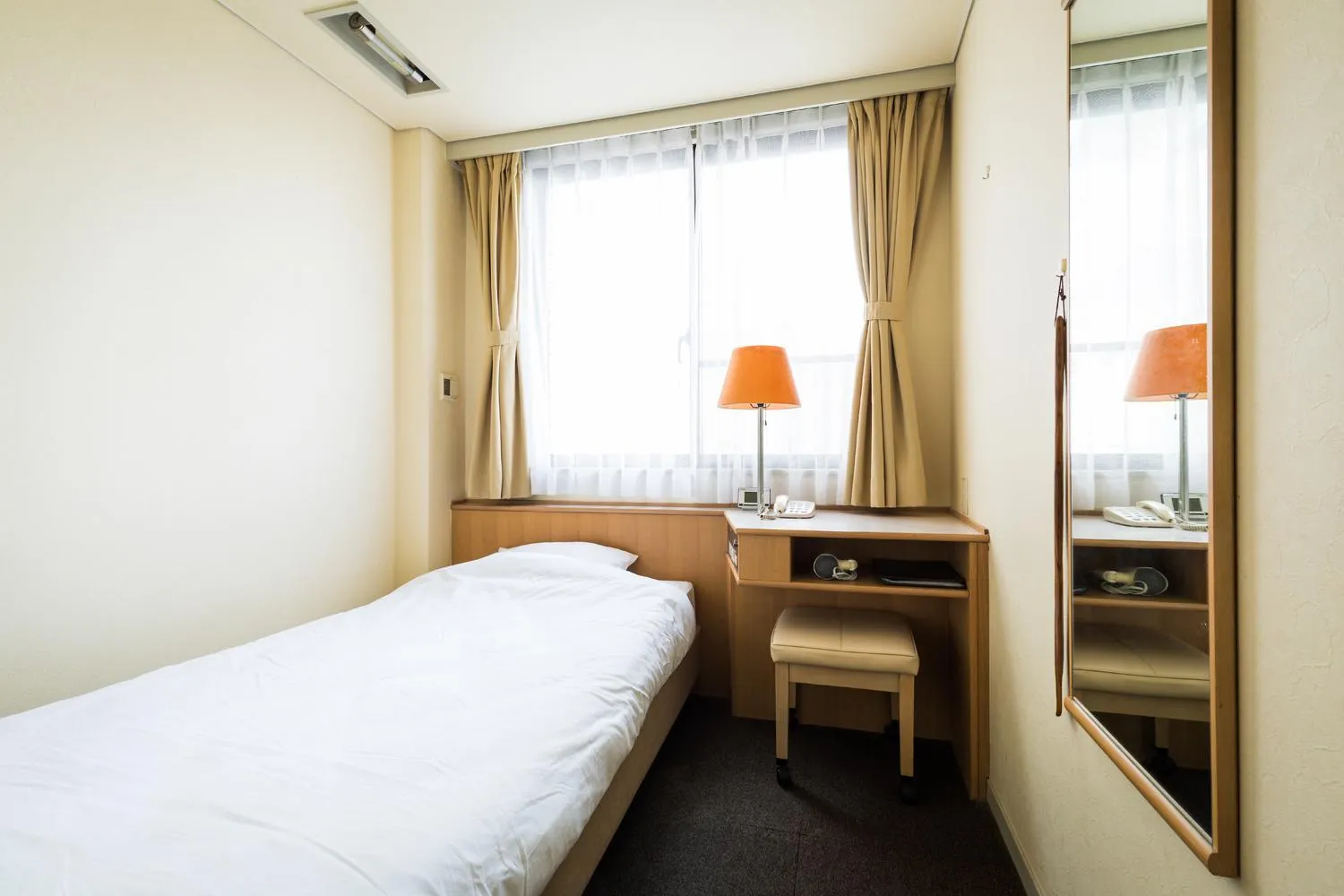 Photo of the whole room, Bed in Hotel Sun Garden Matsuyama