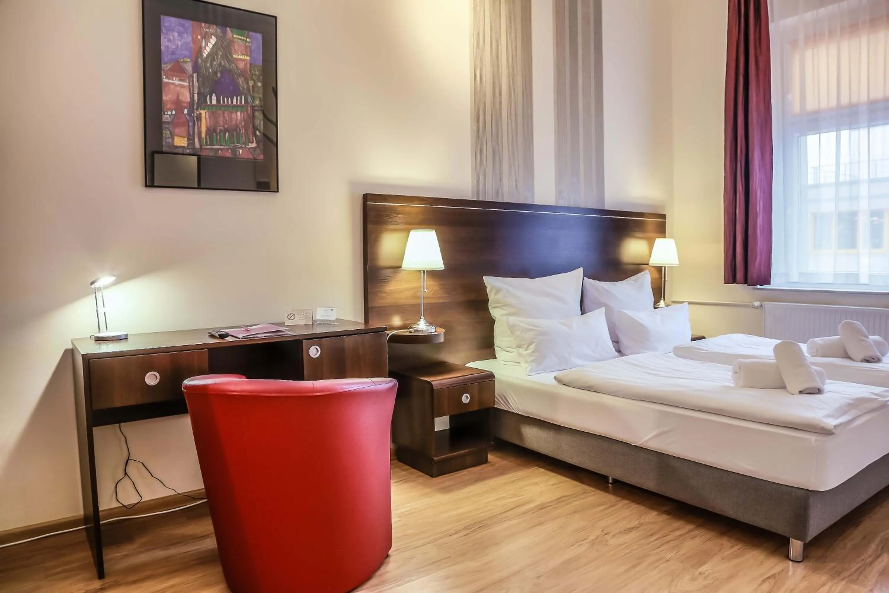 Photo of the whole room, Bed in City Residence Hotel Frankfurt-Oder Bahnhof