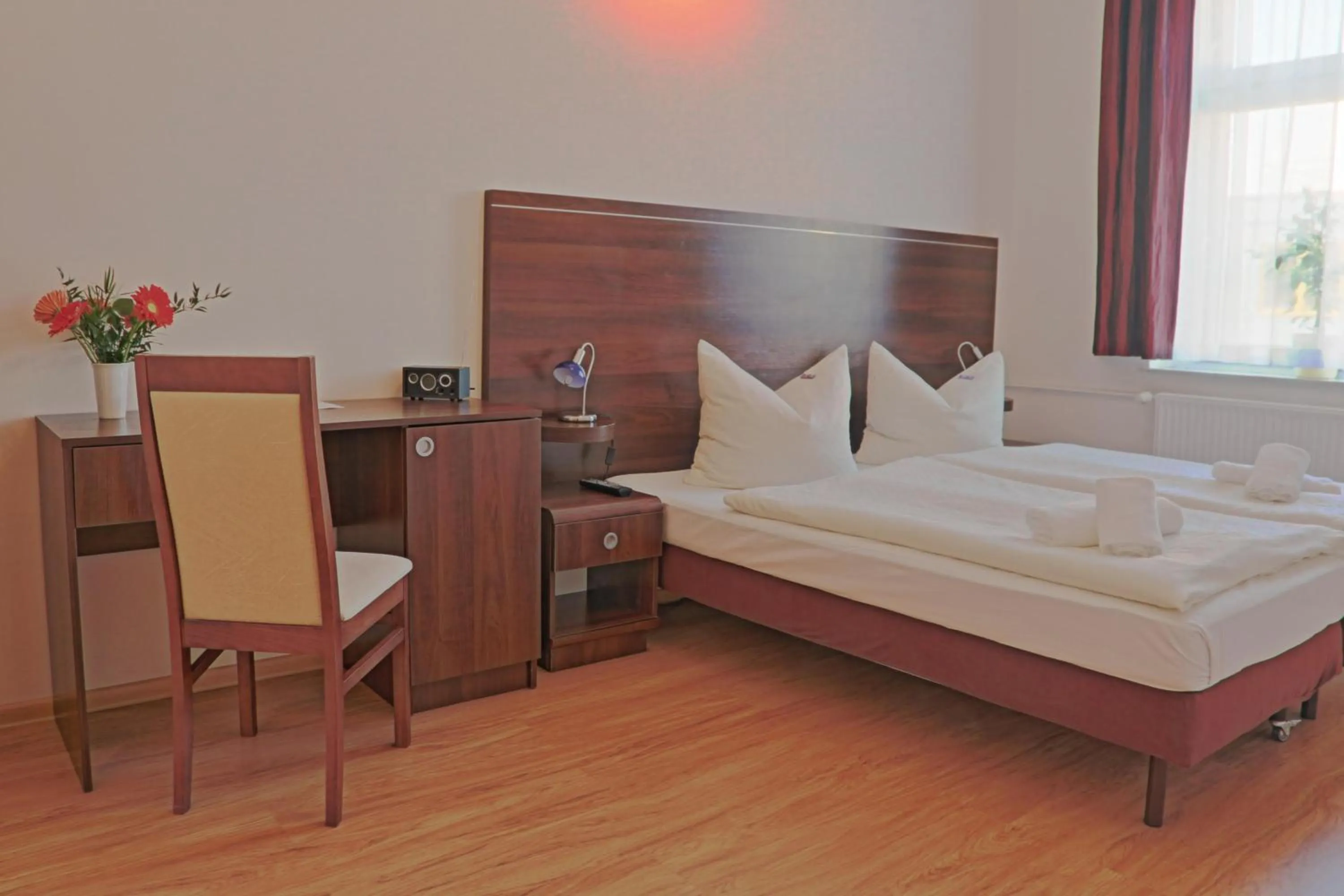 Photo of the whole room, Bed in City Residence Hotel Frankfurt-Oder Bahnhof