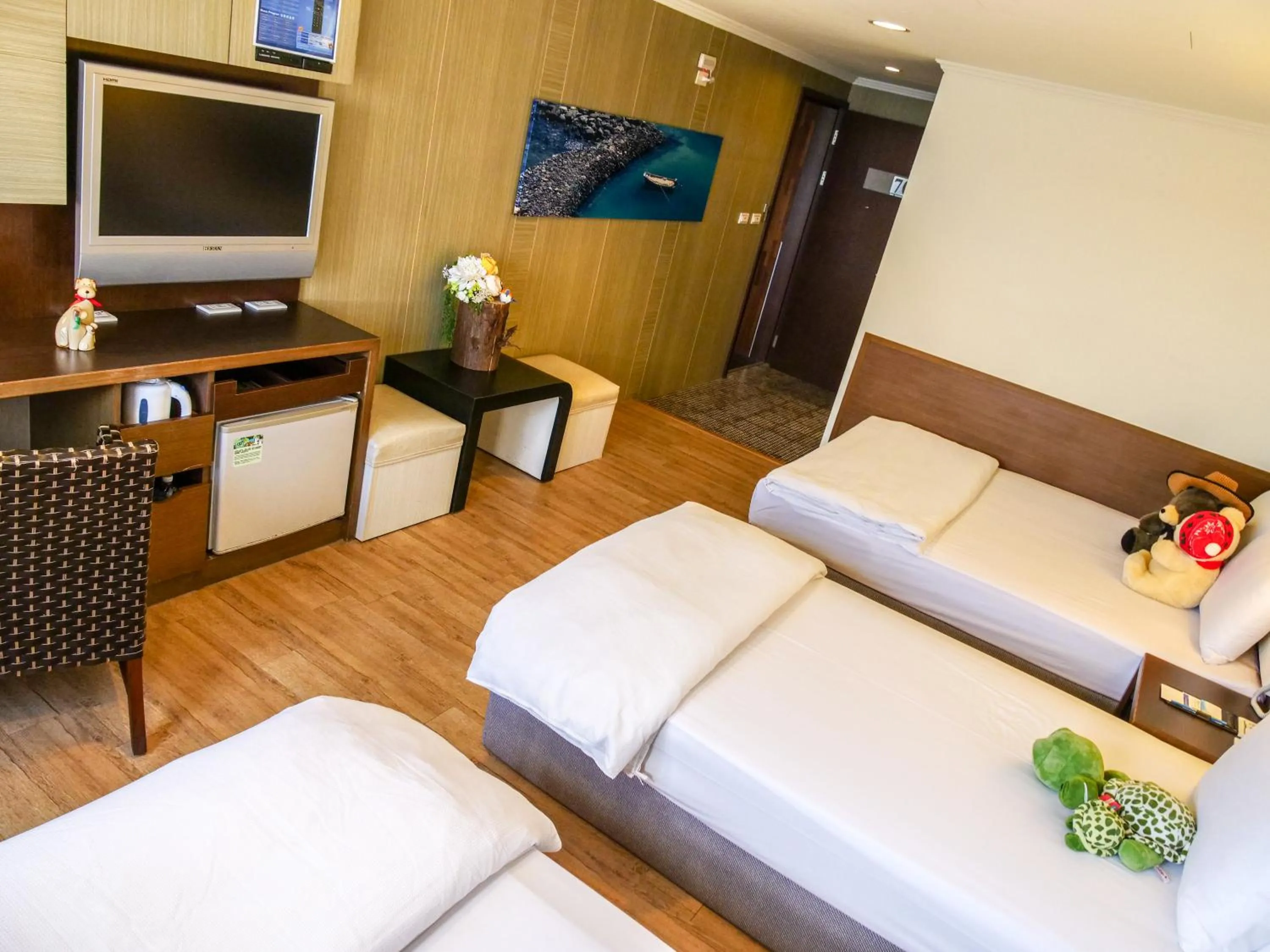 Photo of the whole room, Bed in MF Hotel, penghu