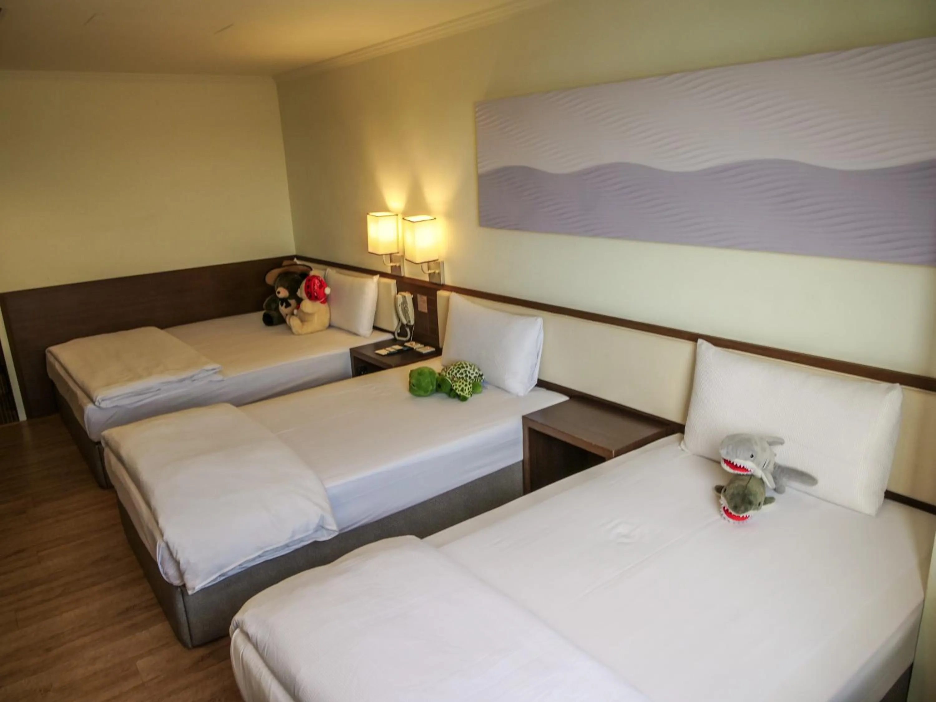 Photo of the whole room, Bed in MF Hotel, penghu
