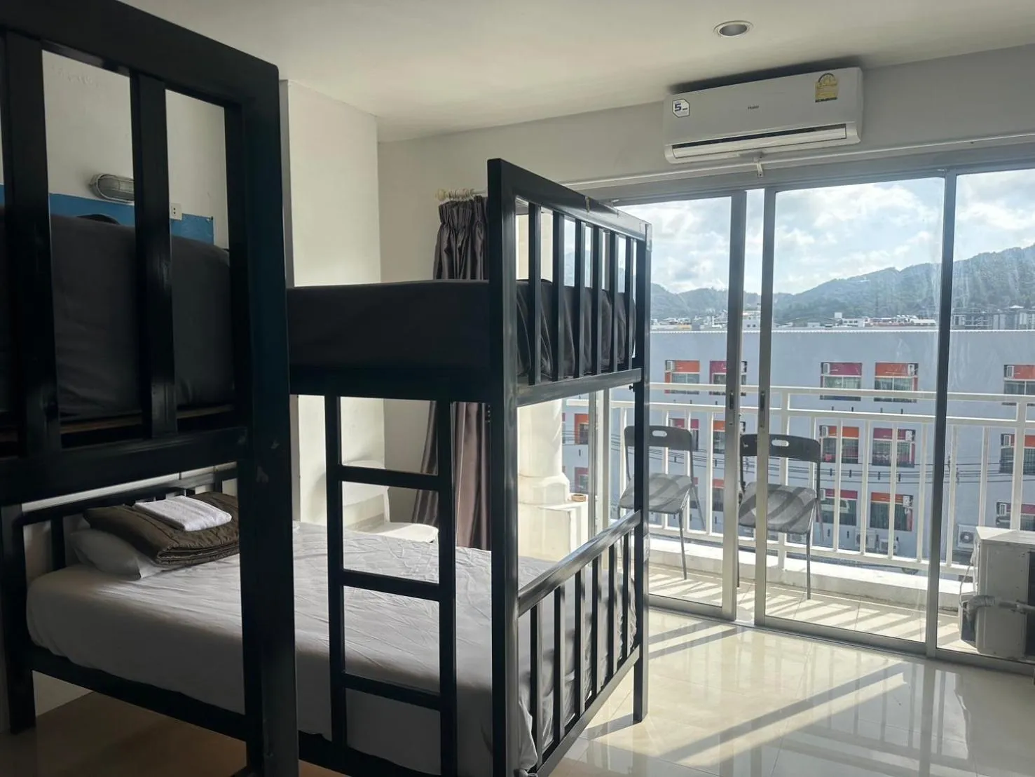 Bed in Happy Fish Guesthouse