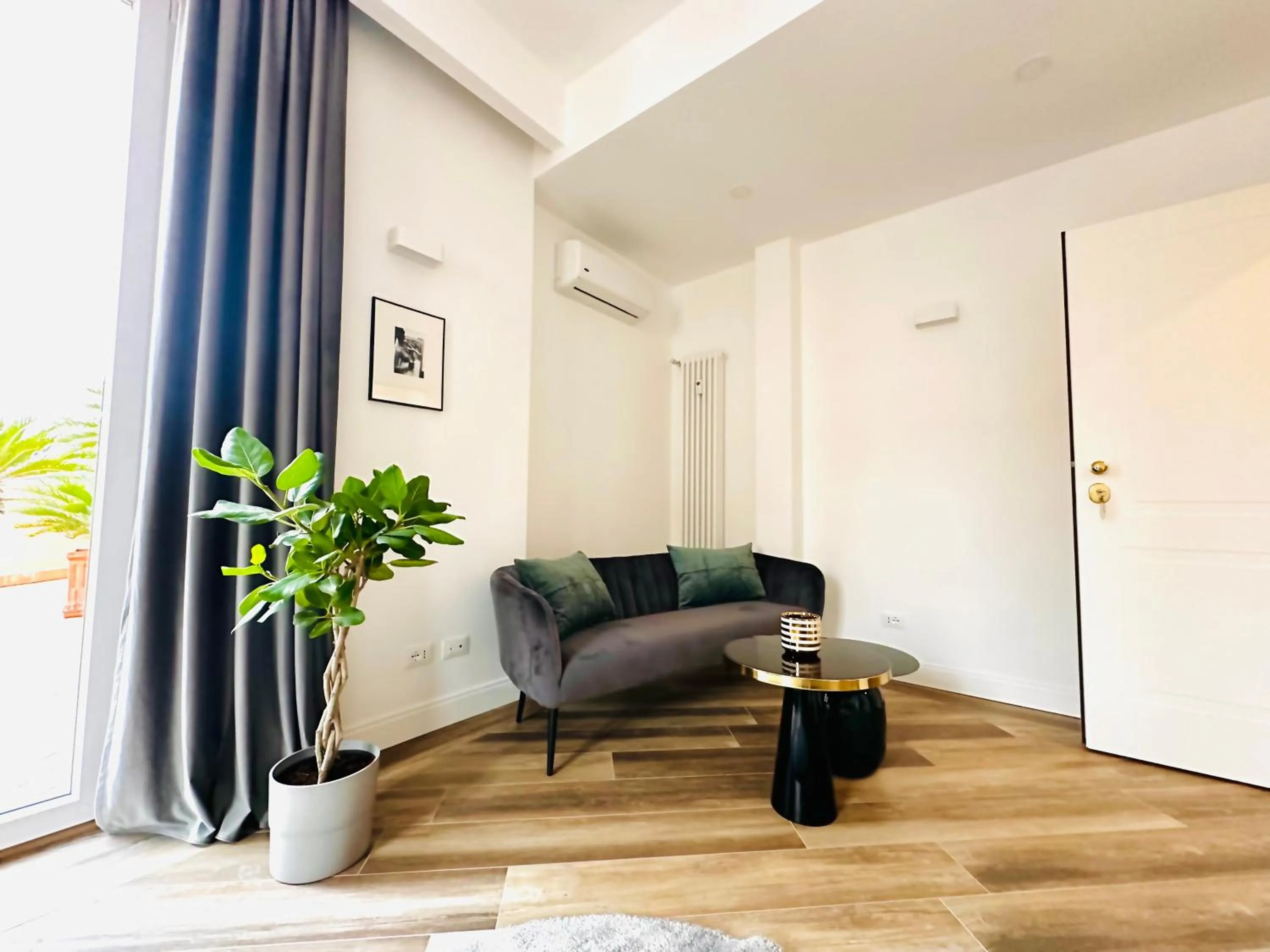 Seating area in All Comfort Astoria Palace