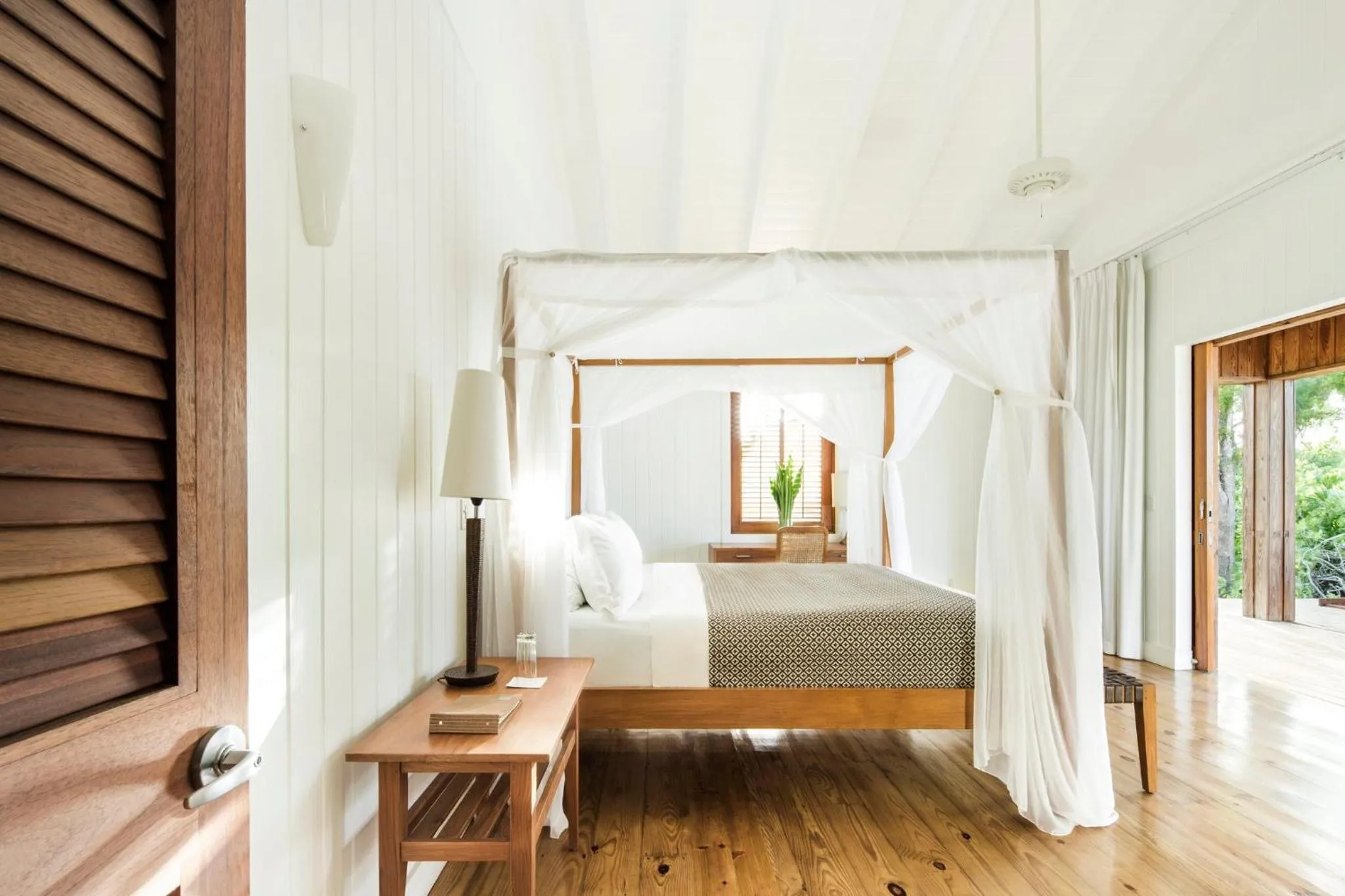 Photo of the whole room, Bed in COMO Parrot Cay