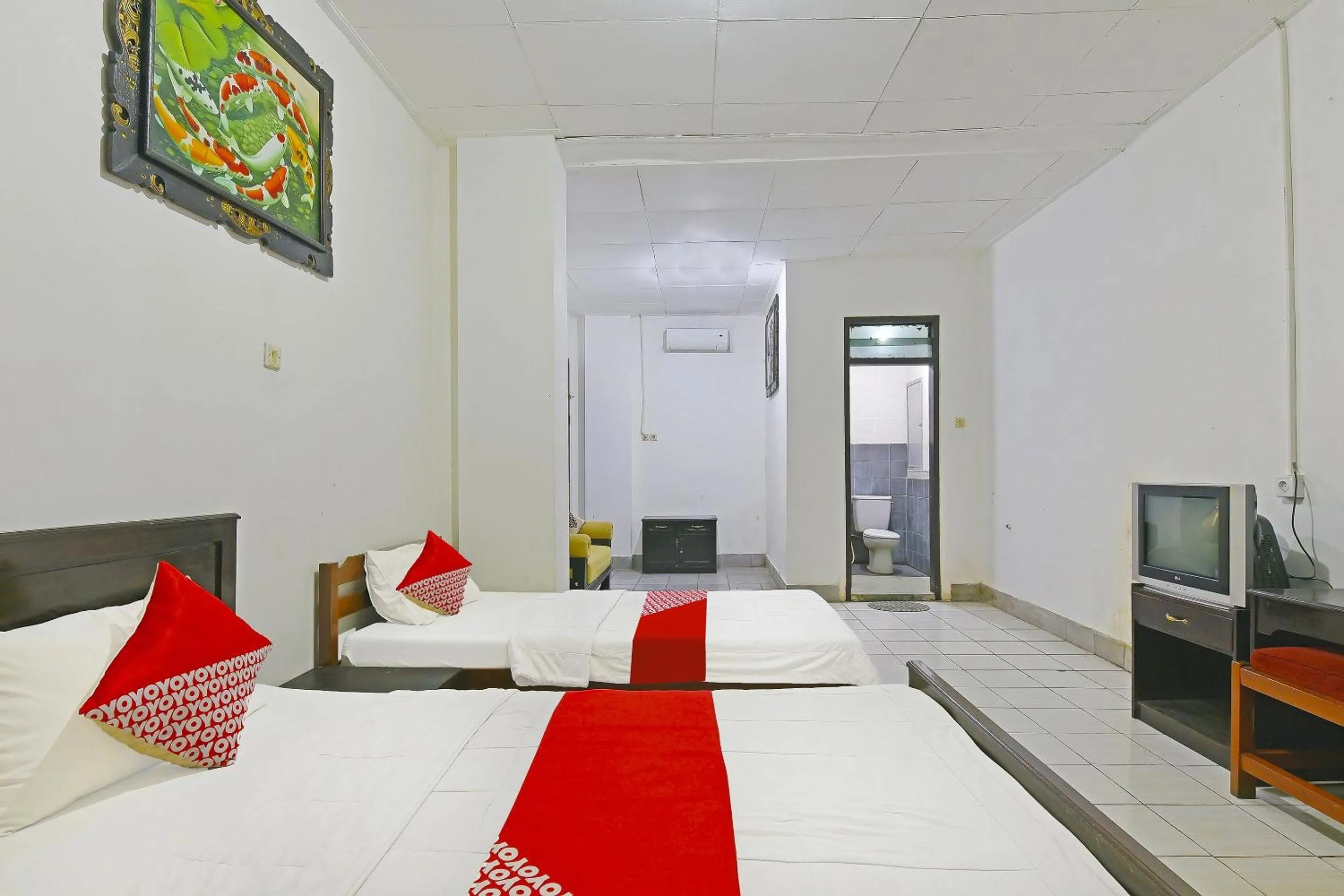 Bedroom in OYO 3244 Grand Chandra Hotel