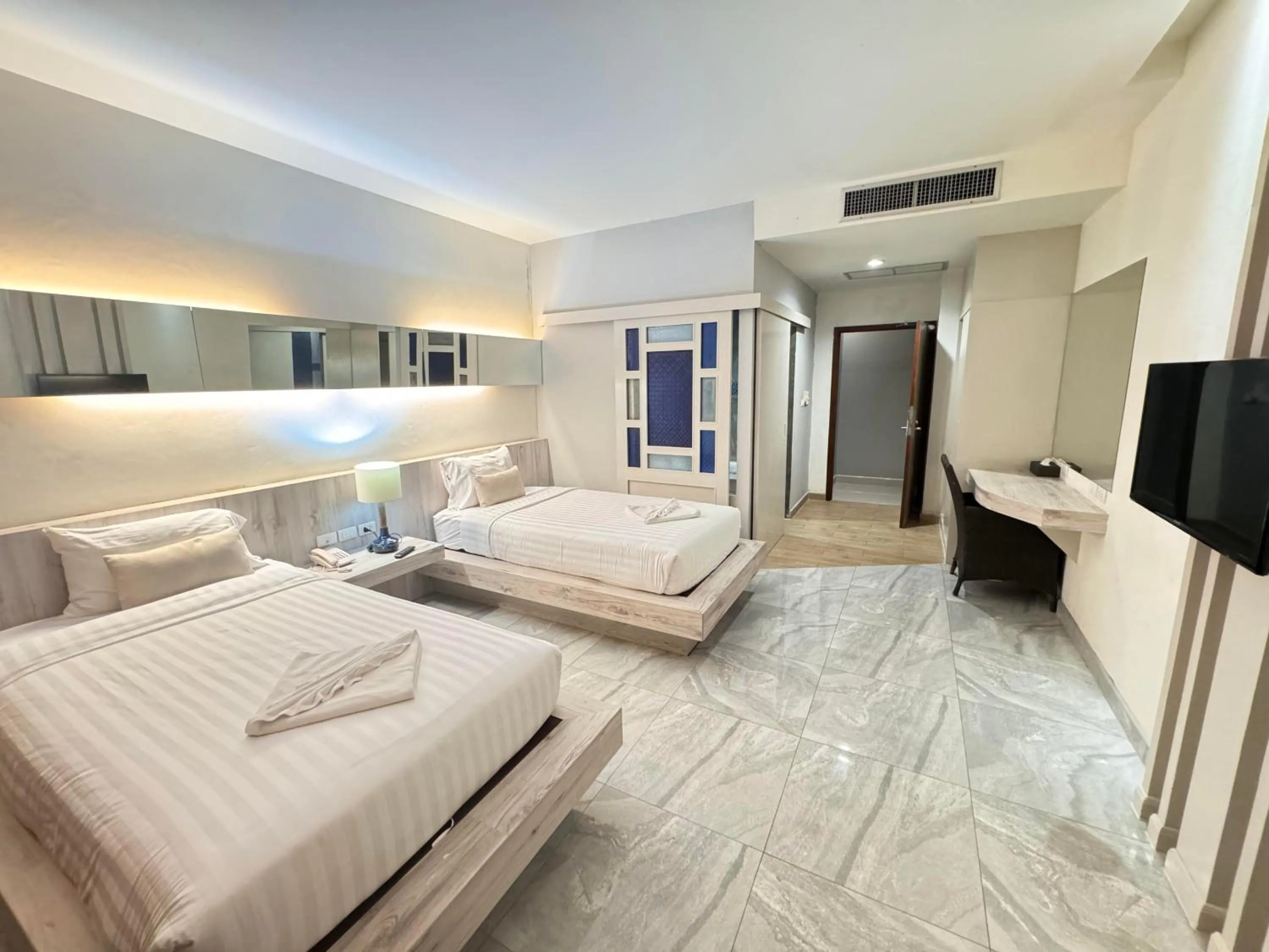 Bed in De Cozé Hotel