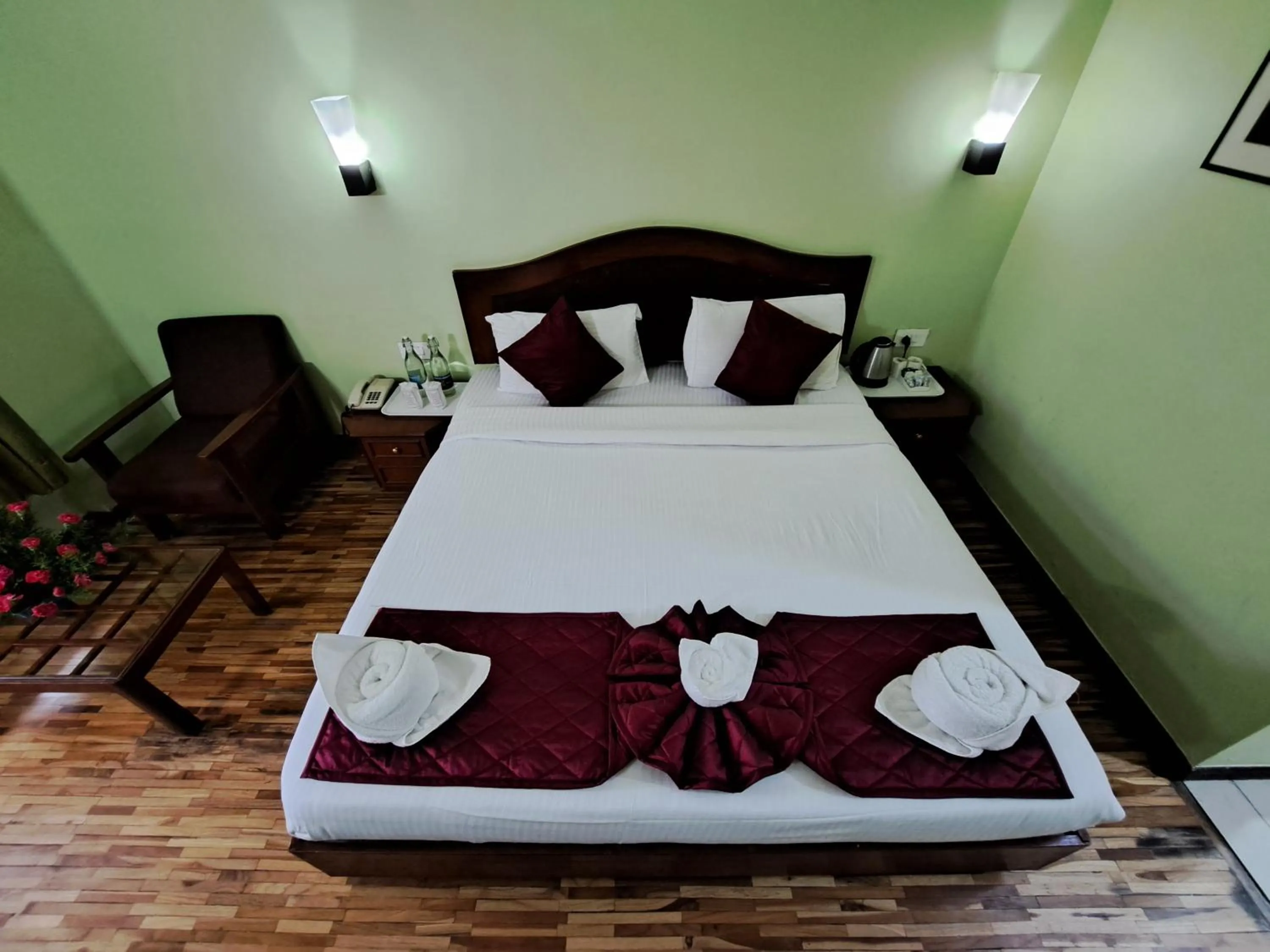 Bed in Hotel Preethi Classic Towers