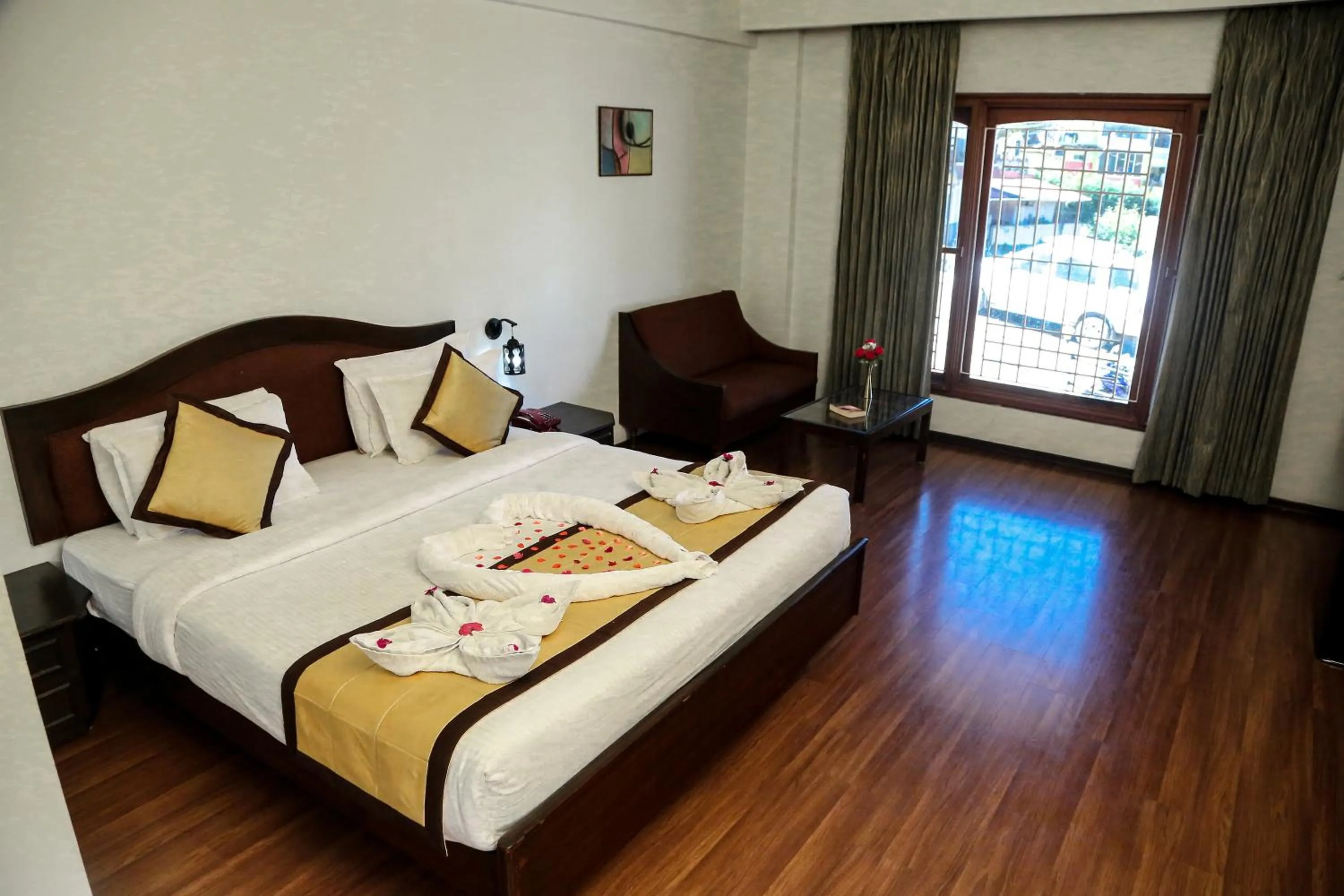 Bed in Hotel Preethi Classic Towers