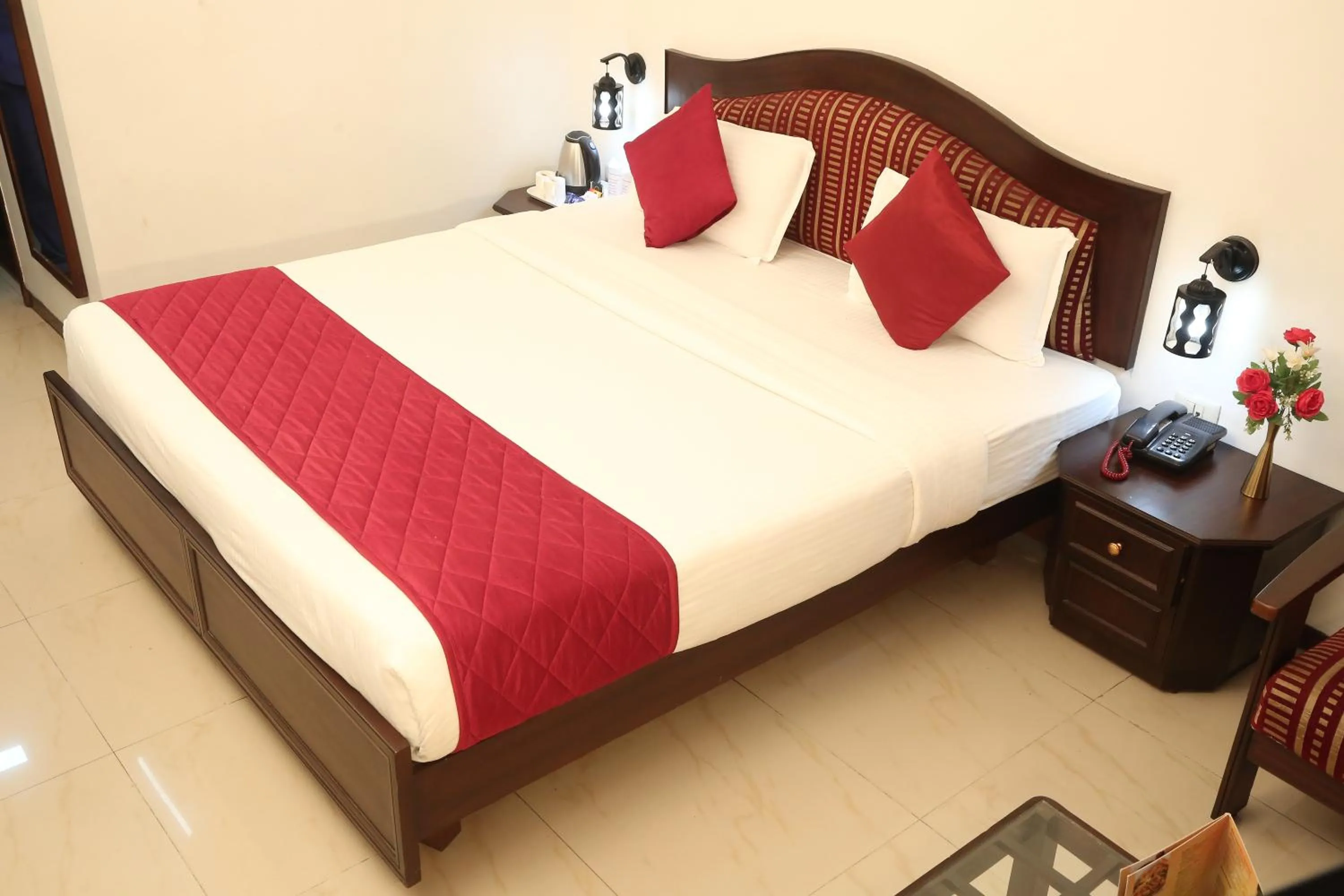 Bed in Hotel Preethi Classic Towers
