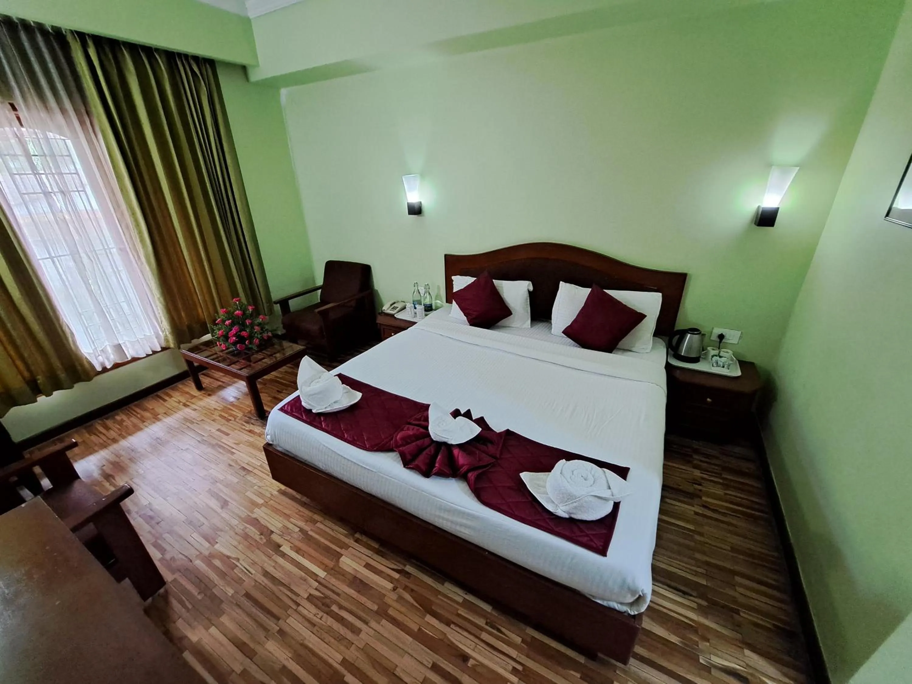 Bed in Hotel Preethi Classic Towers