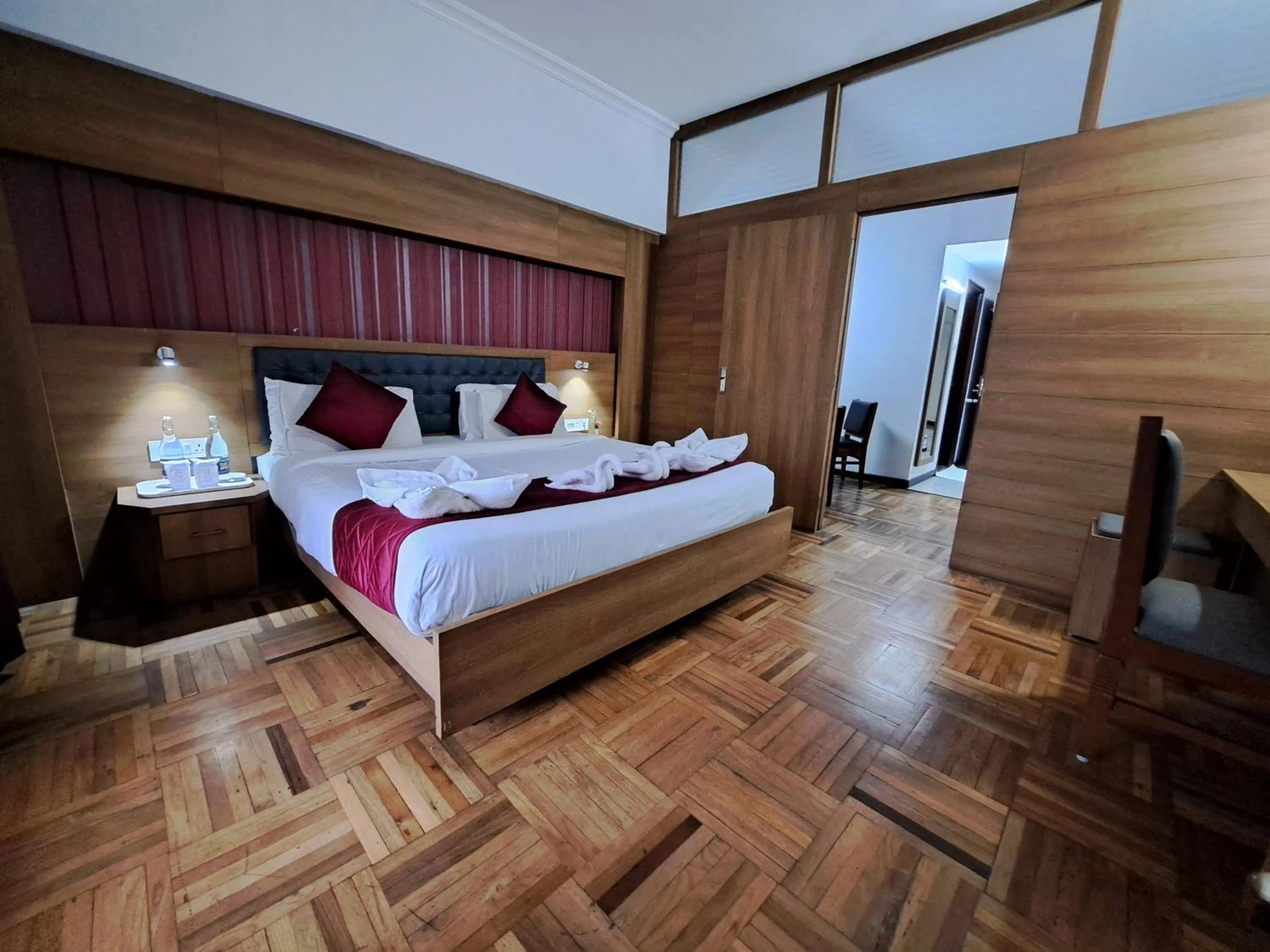 Bed in Hotel Preethi Classic Towers