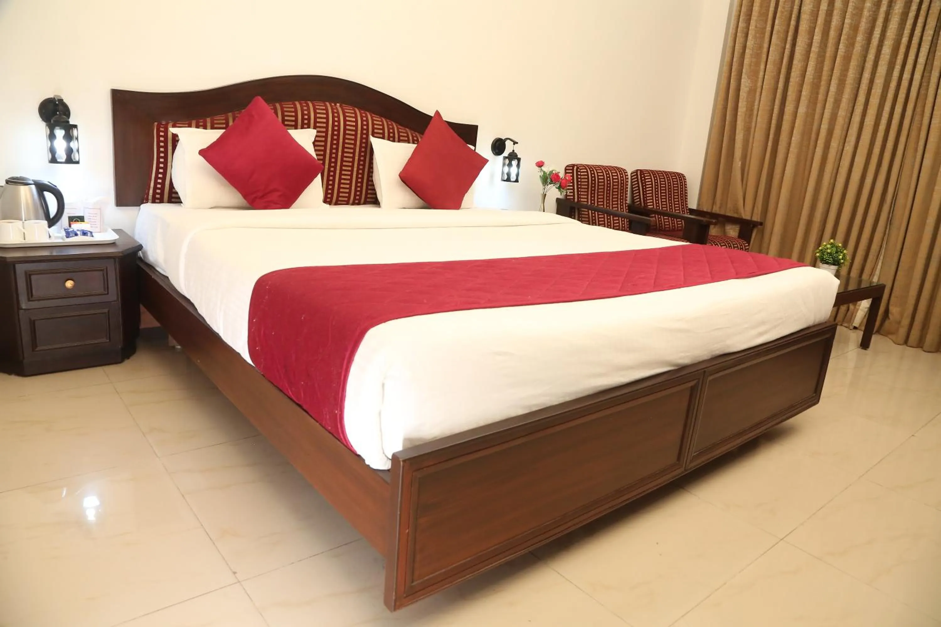 Bed in Hotel Preethi Classic Towers
