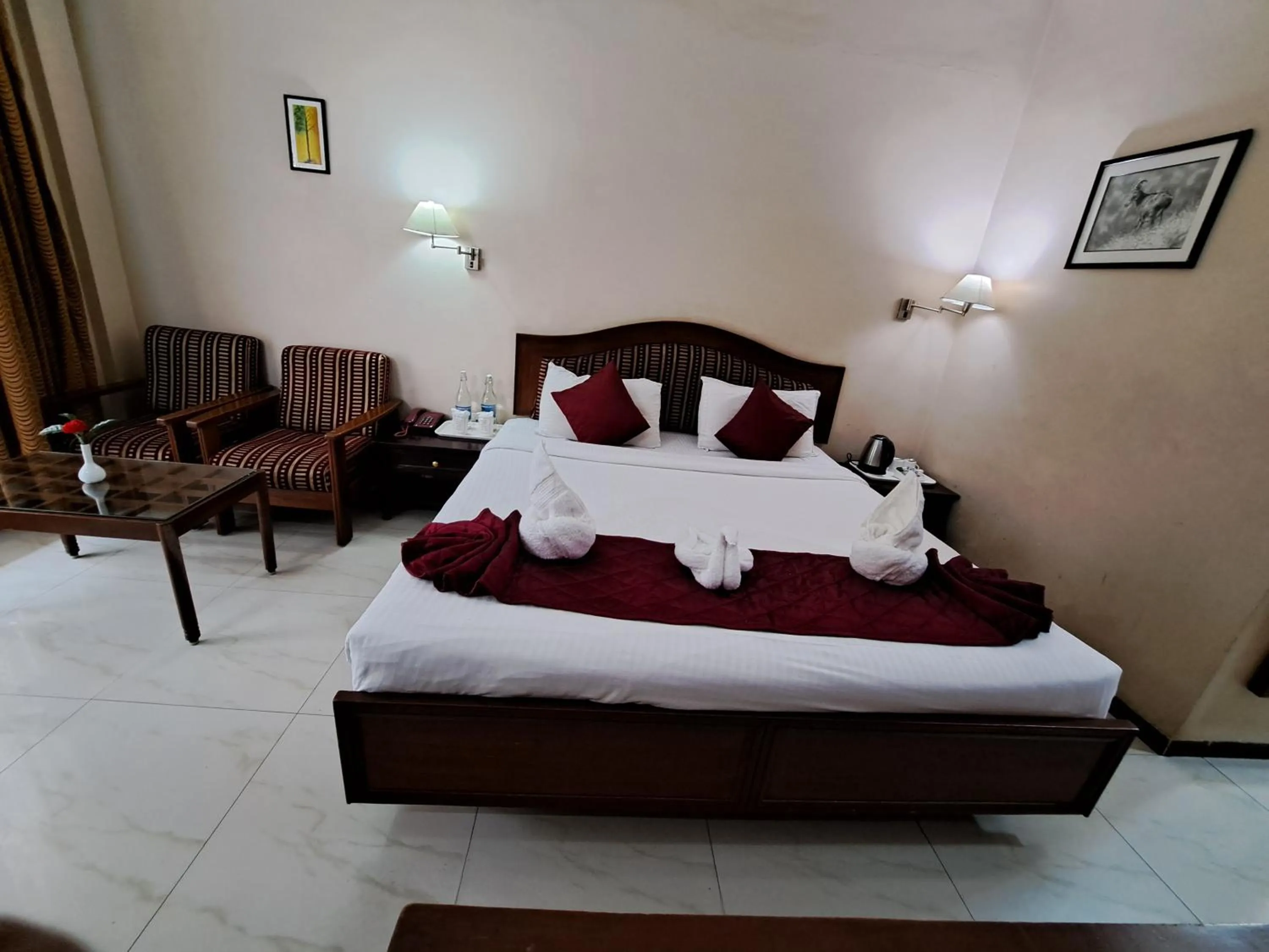 Bed in Hotel Preethi Classic Towers