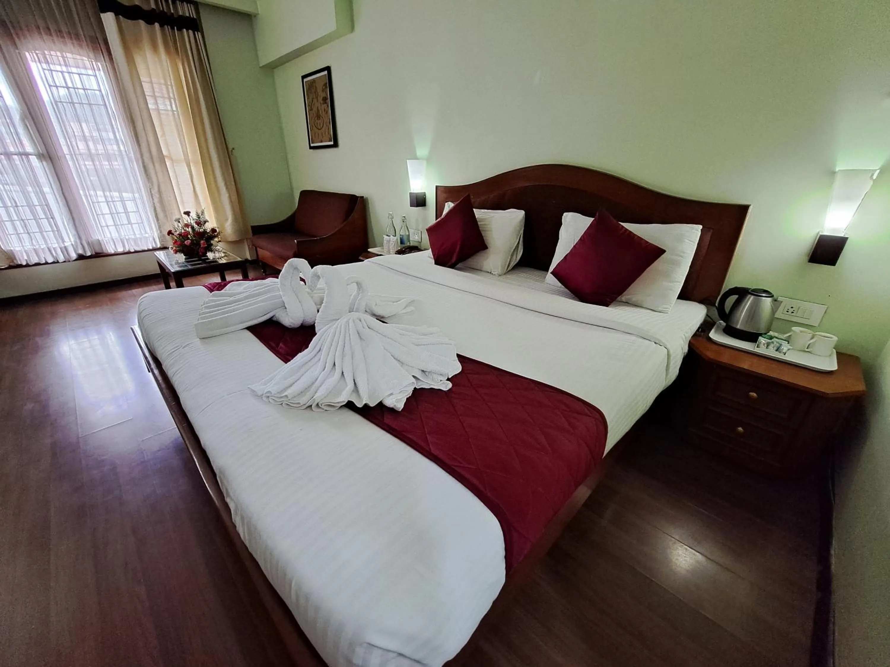 Bed in Hotel Preethi Classic Towers