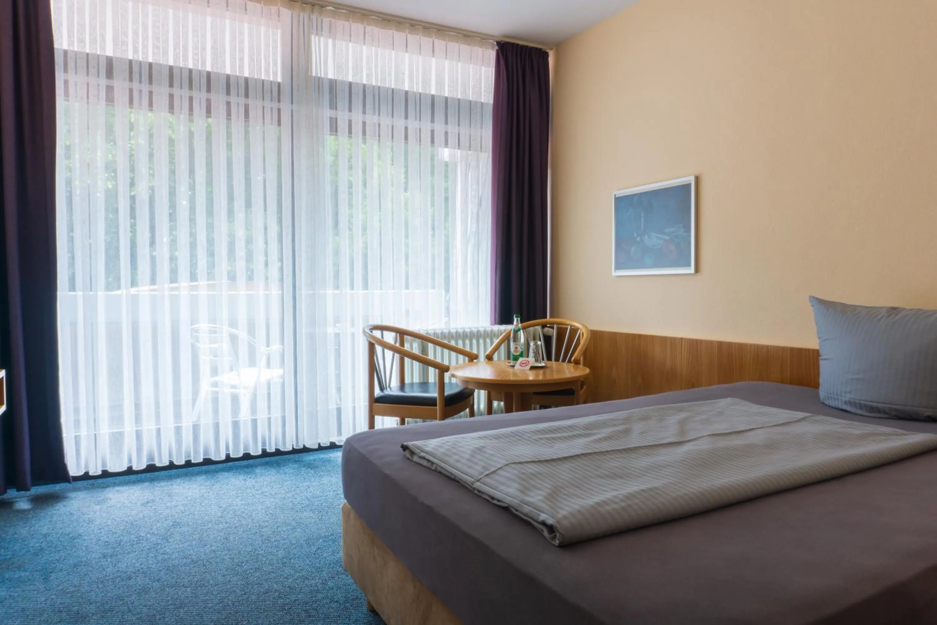 Photo of the whole room, Bed in Reichels Parkhotel