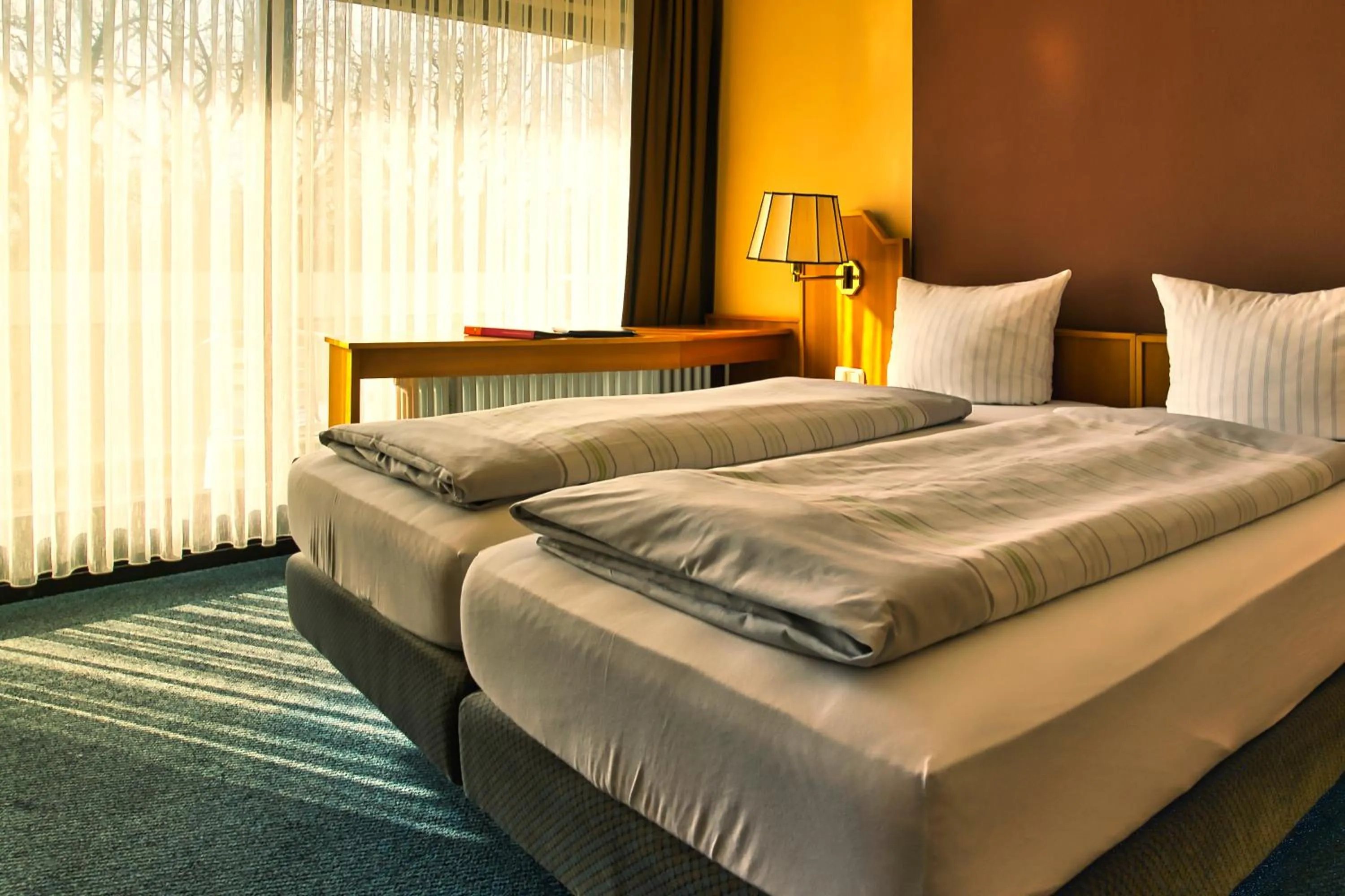 Photo of the whole room, Bed in Reichels Parkhotel