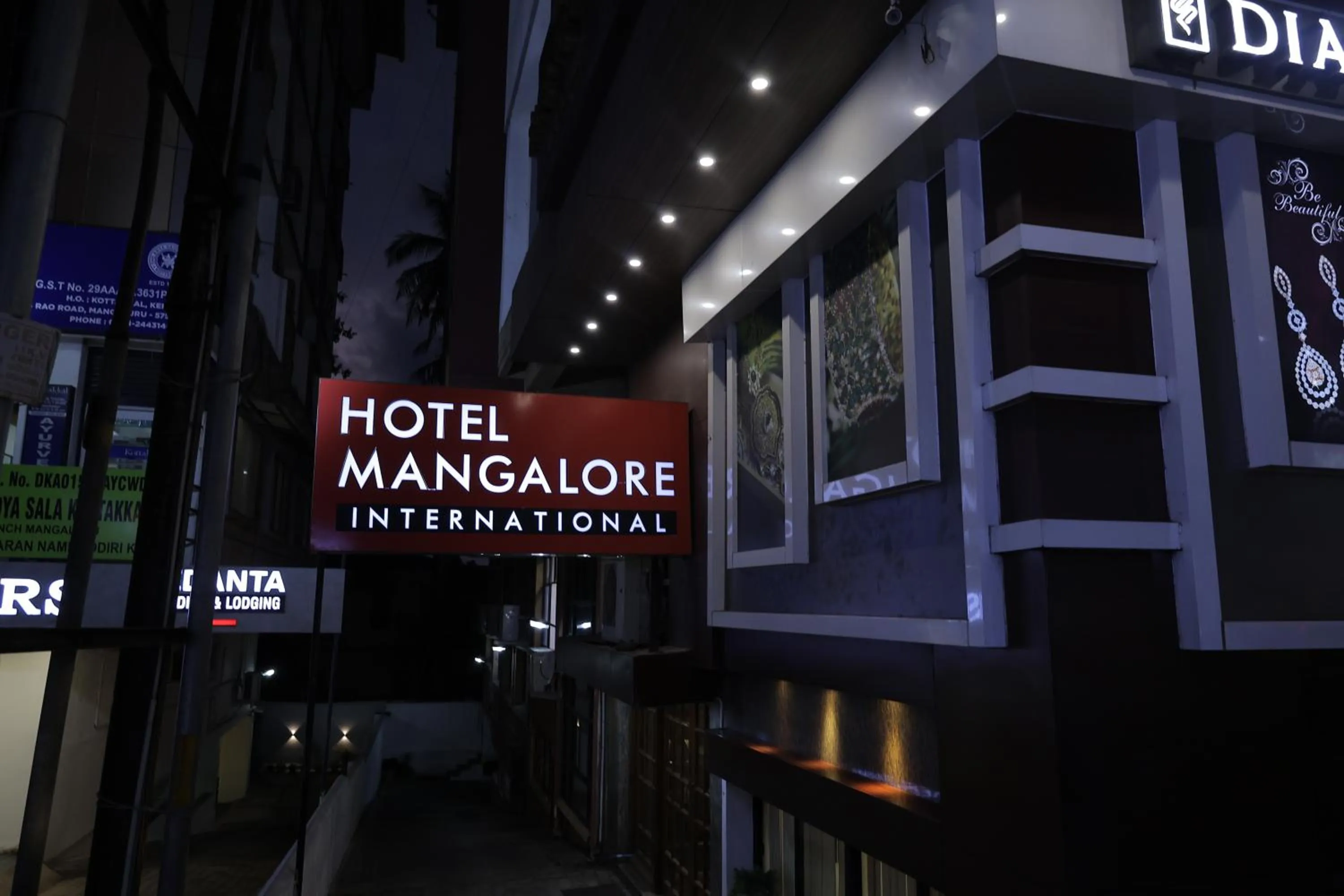 Property logo or sign in Hotel Mangalore International