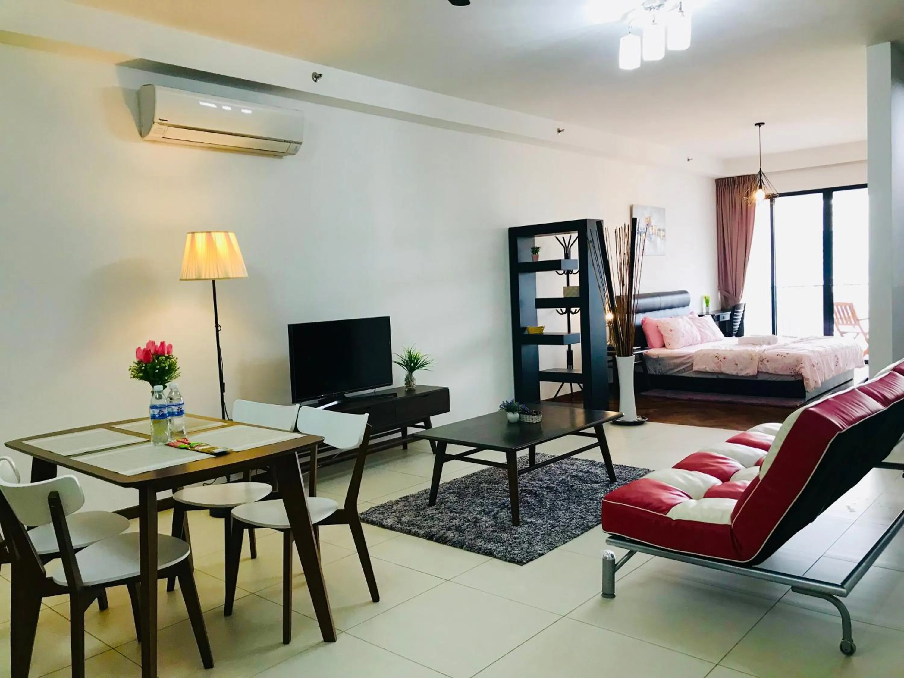 Living room, Bed in The Landmark by Katana