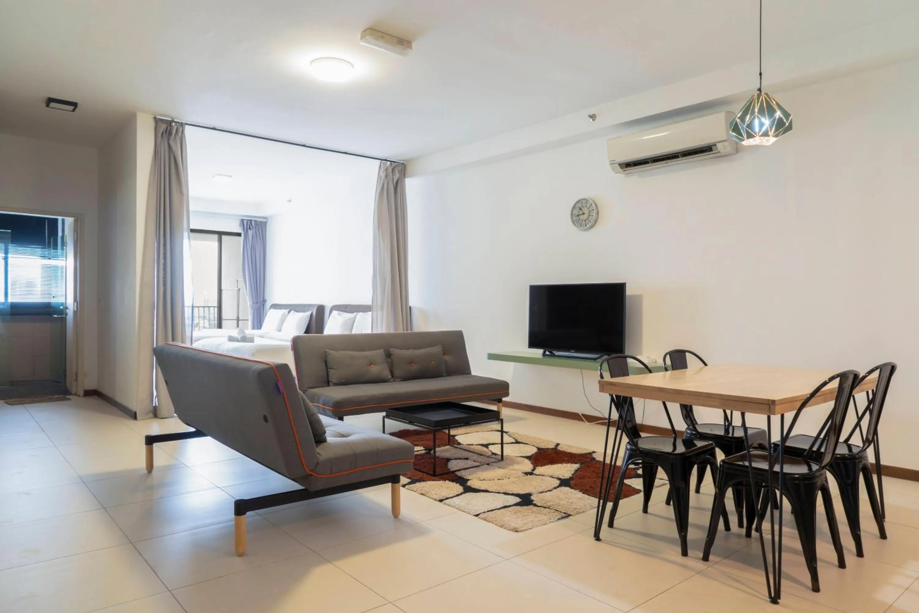 Living room in The Landmark by Katana