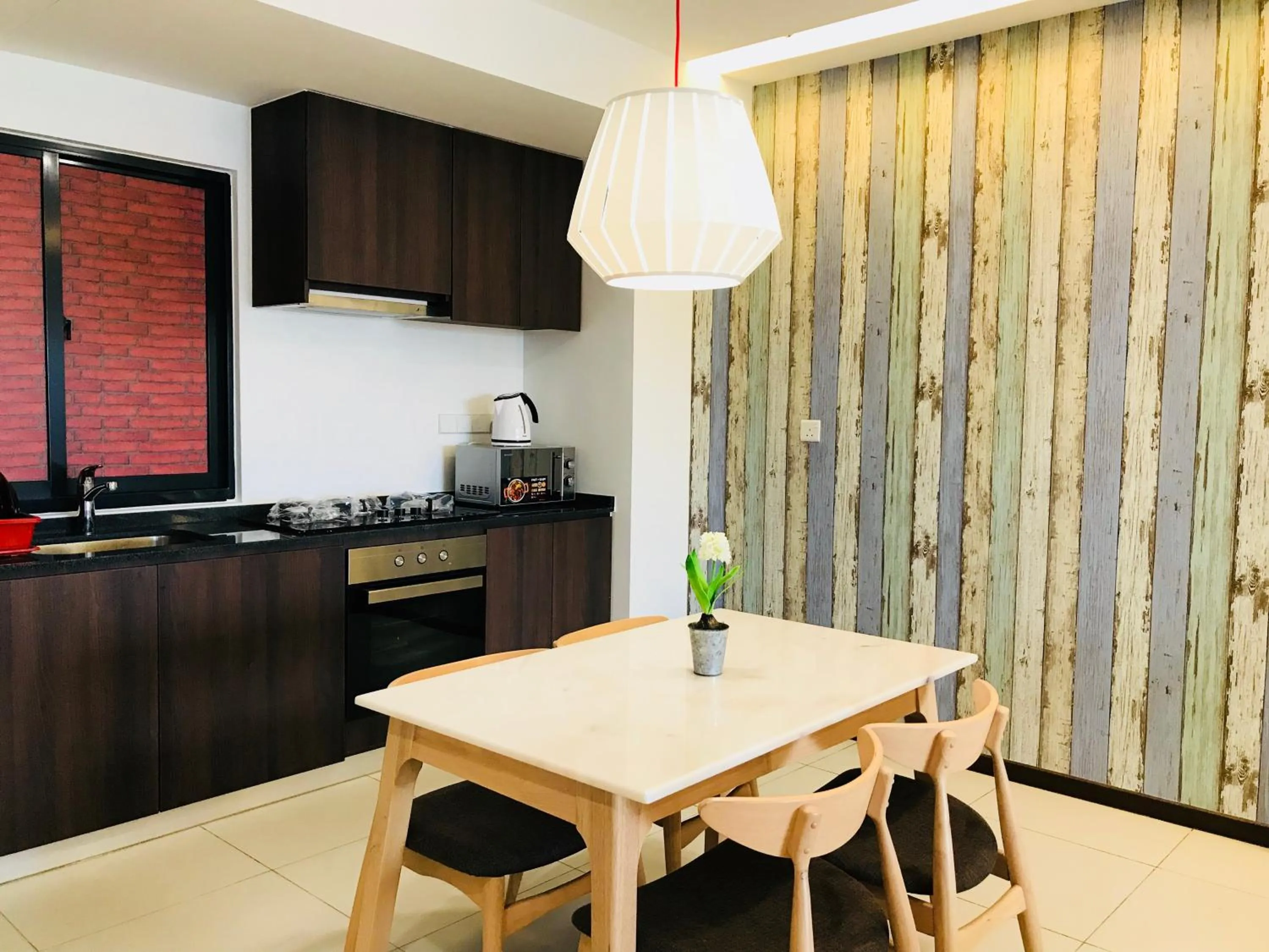 Kitchen or kitchenette in The Landmark by Katana