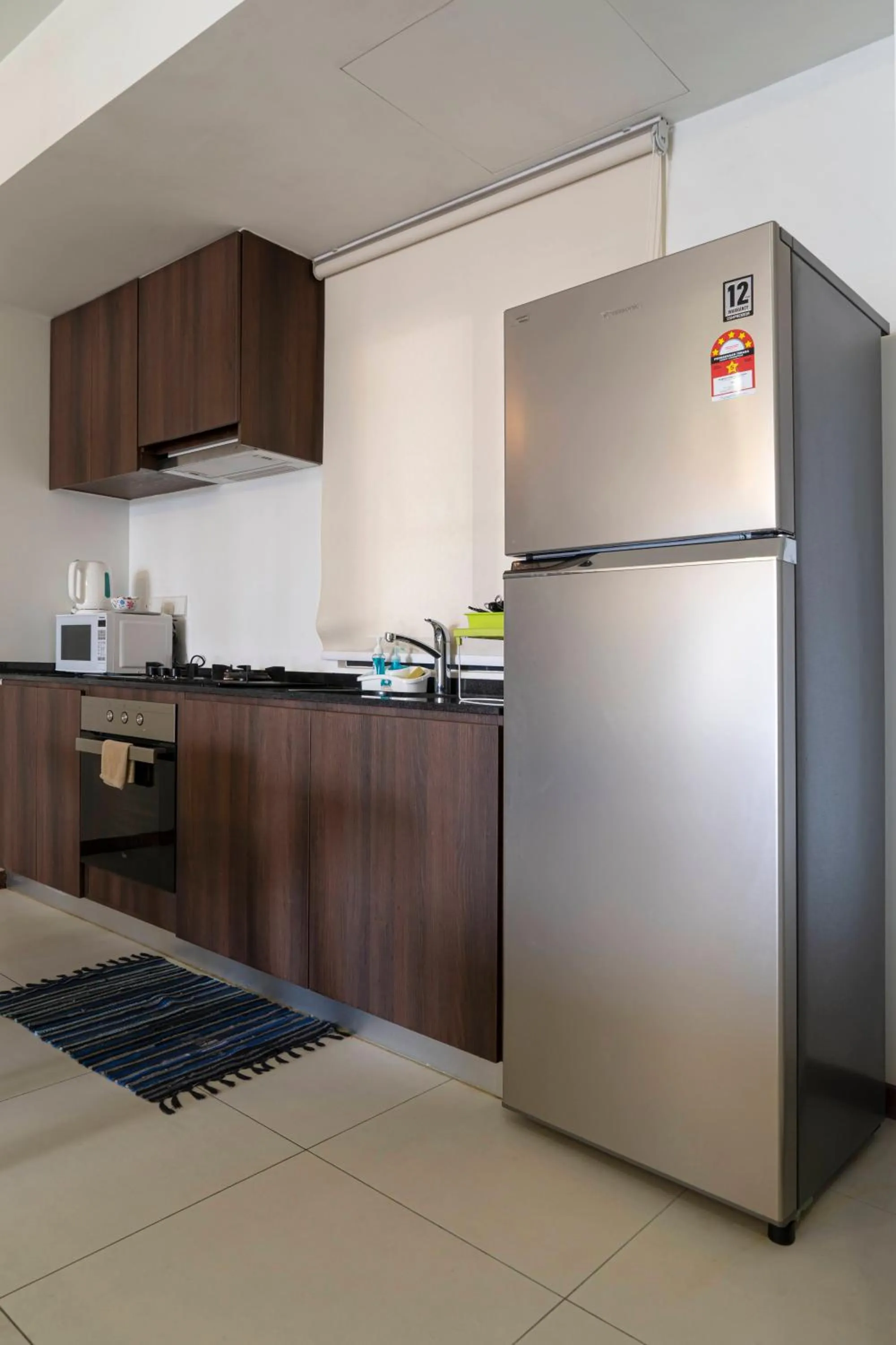 Kitchen or kitchenette in The Landmark by Katana