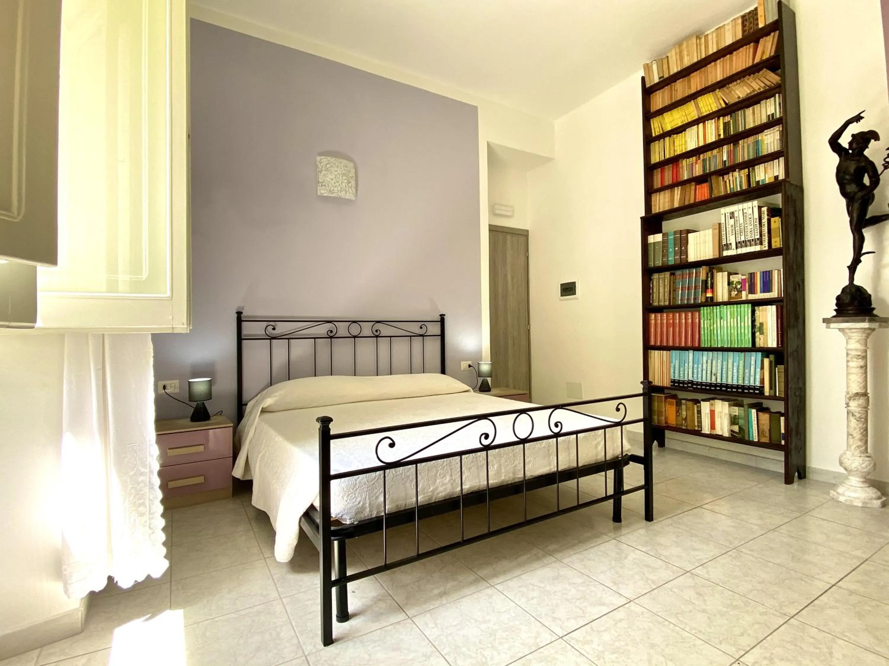 Bed in Villa Rocco Rooms