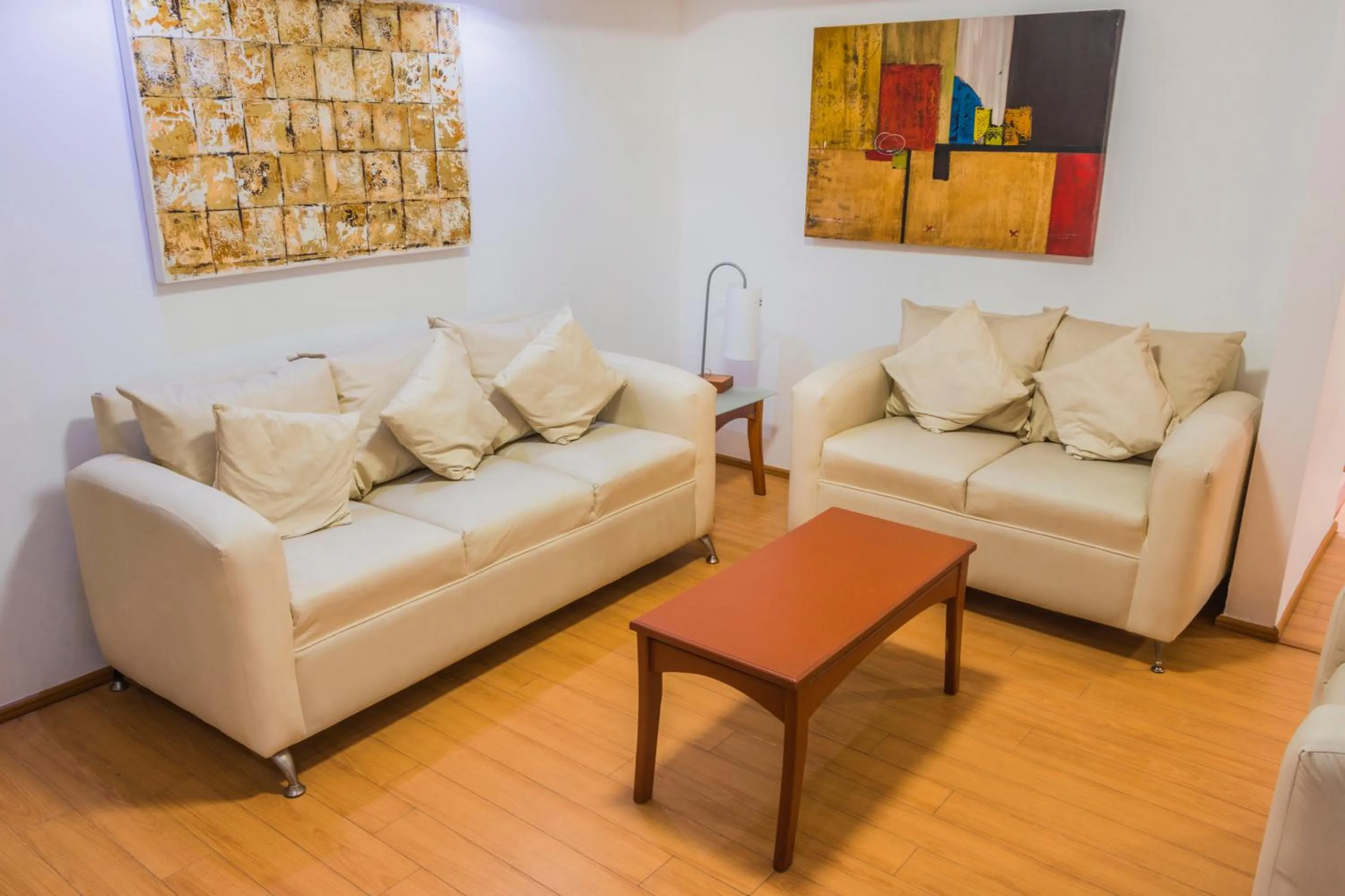 Living room in European Life Style Executive Suites