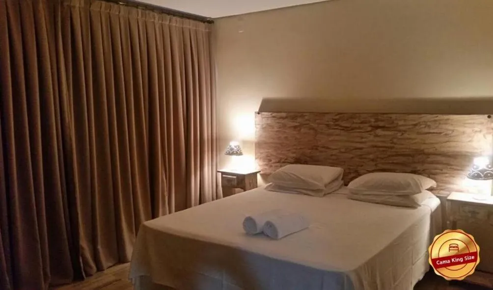 Bedroom in Pousada Candonga da Serra