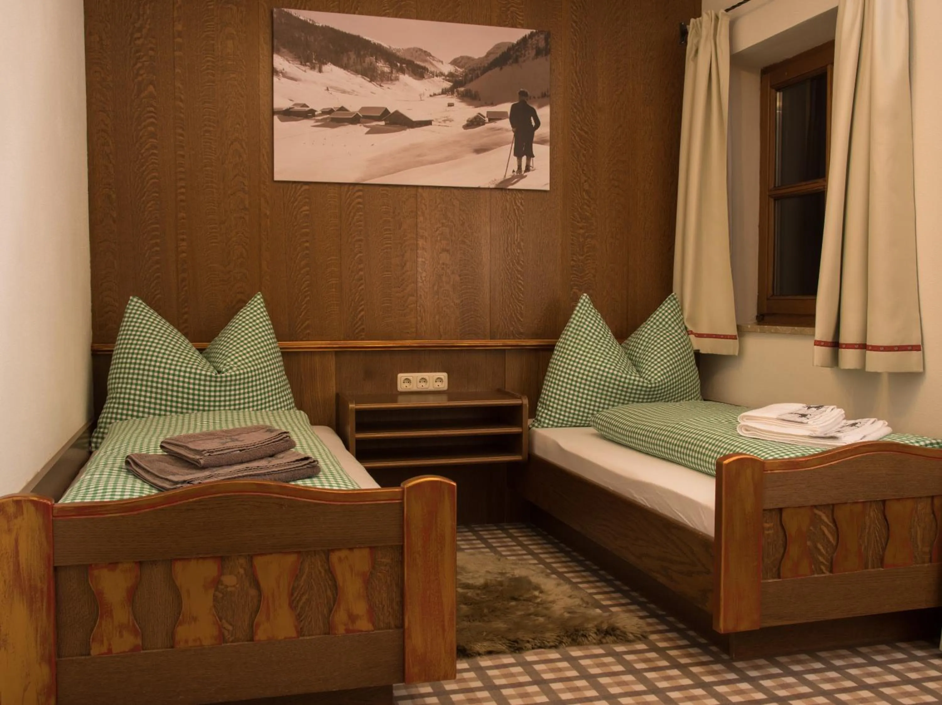 Bed in Landhaus Alpenjuwel