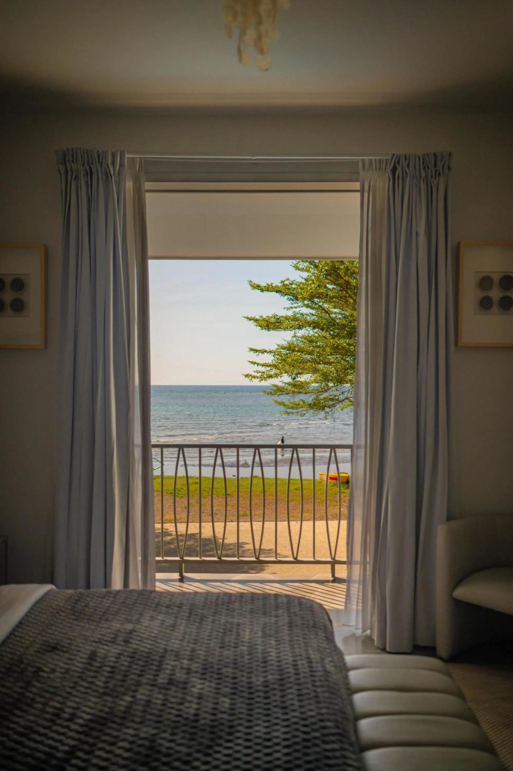 Bed in Lusa Beach Studios Under New Management And Newly Renovated