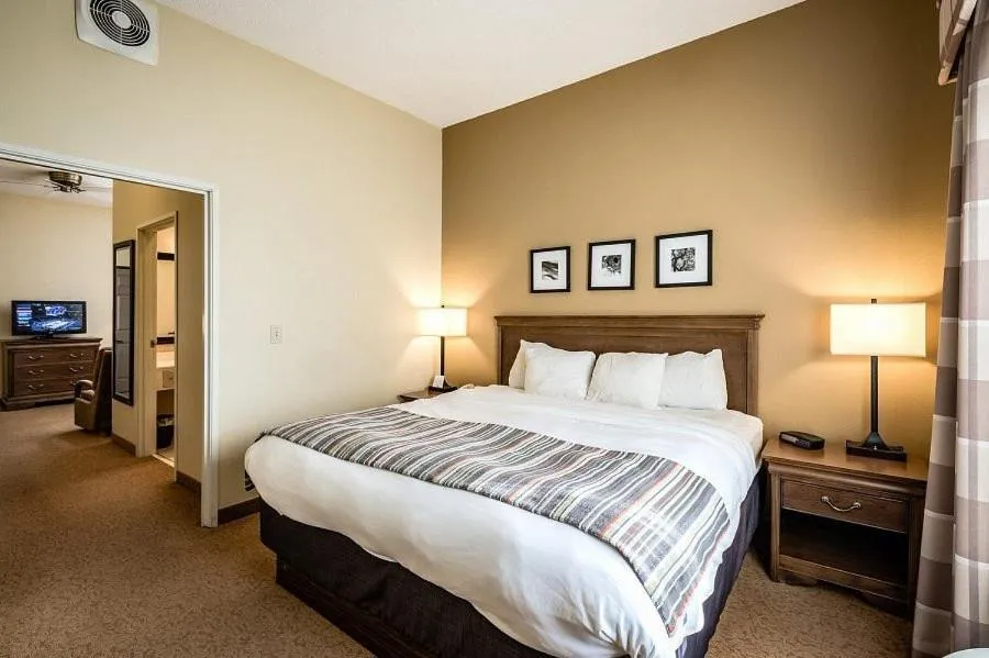 Bed in Country Inn & Suites by Radisson, Salina, KS